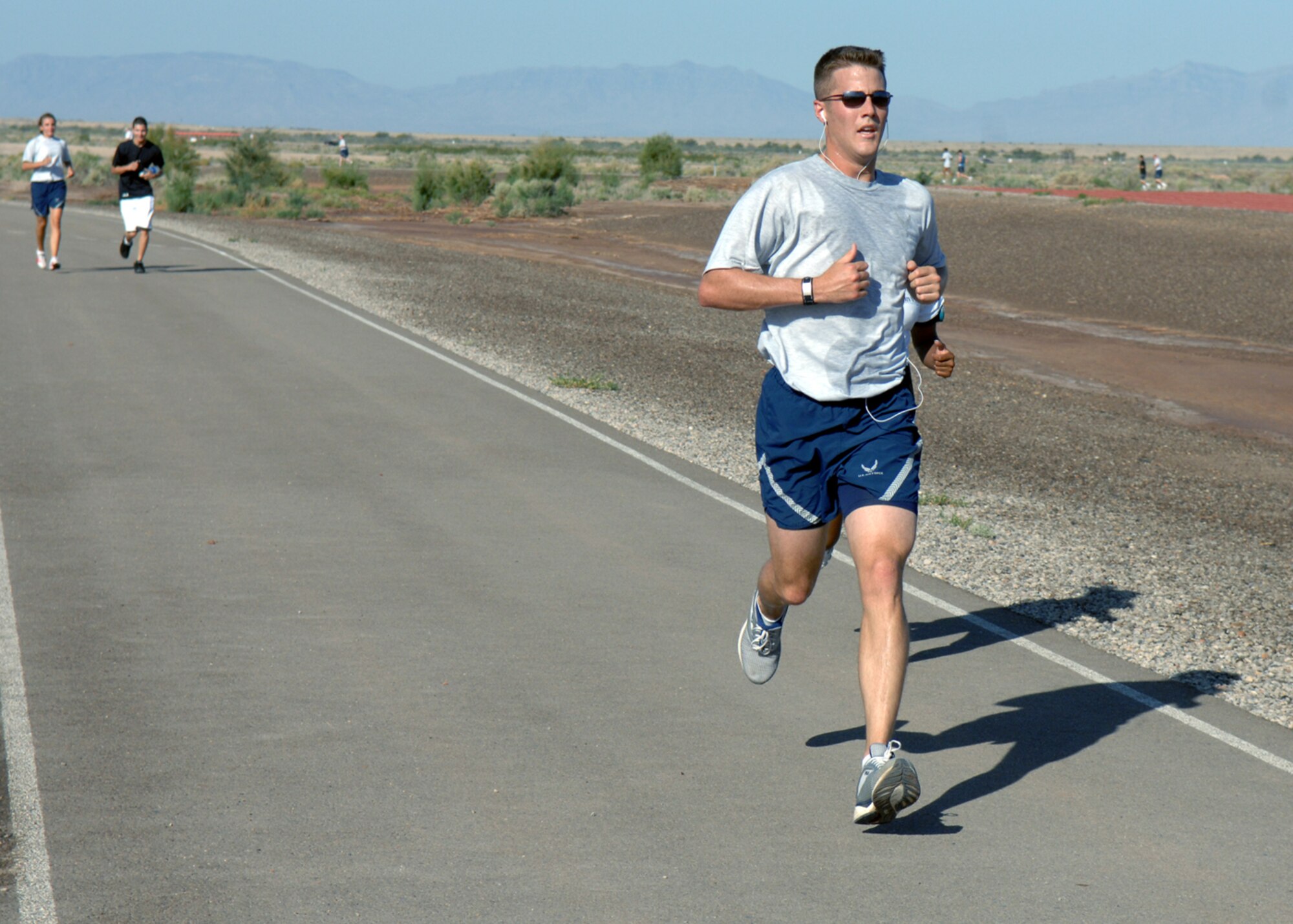 1st Lt. David Heichemer, 49th Contracting Squadron, prepares to cross the finish line during the four mile Freedom Fest Fun Run, hosted by the 49th Force Support Squadron July 3 at Holloman Air Force Base, N.M. Lieutenant Heichemer finished 1st overall in the male category with a time of 25:06. Holloman hosted the Freedom Fest Fun Run and other events as a way of
celebrating Independence Day.

(U.S. Air Force photo/Senior Airman Anthony Nelson Jr)
