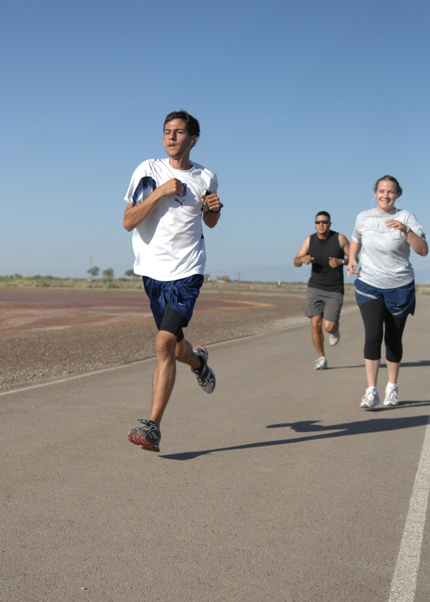 Matthew Harrigian, son of 49th Fighter Wing Commander, Col. Jeff Harrigian, stretches out in front of the pack during the four mile Freedom Fest Fun Run, hosted by the 49th Force Support Squadron July 3 at Holloman Air Force
Base, N.M. Matthew Harrigian placed 2nd overall in the male category. Holloman hosted the Freedom Fest Fun Run and other events as a way of celebrating Independence Day. 


(U.S. Air Force photo/Senior Airman Anthony Nelson Jr)
