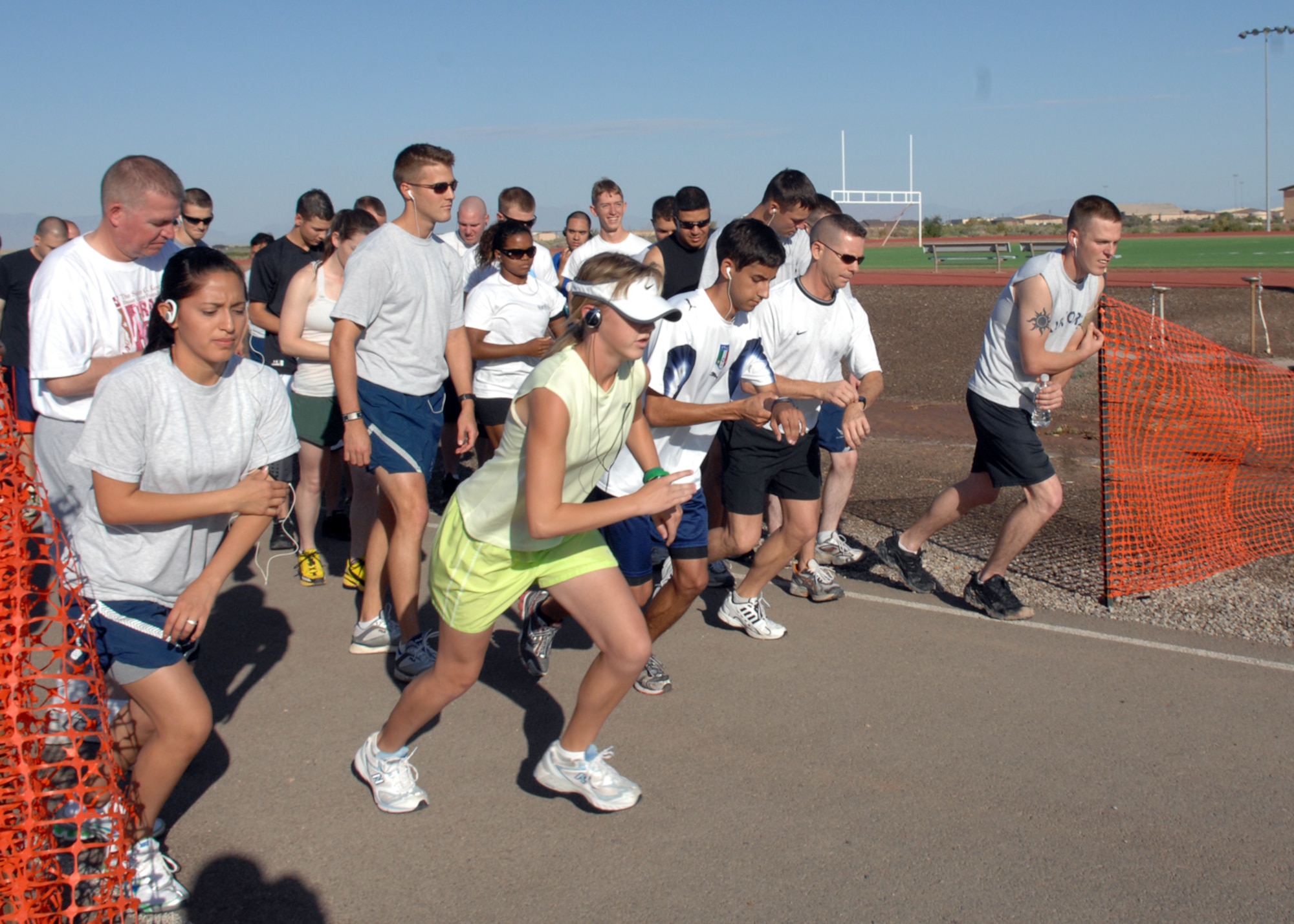 Members of Team Holloman take off during the four mile Freedom Fest Fun Run, hosted by the 49th Force Support Squadron July 3 at Holloman Air Force Base, N.M. Holloman hosted the Freedom Fest Fun Run and other events as a way of celebrating Independence Day.

(U.S. Air Force photo/Senior Airman Anthony Nelson Jr)

