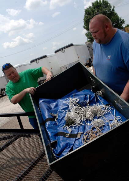 BARKSDALE AIR FORCE BASE, La. - Army Reservist Sgt. 1st Class Terrell Goodwin and his friend load his truck with supplies in preparation for the holiday weekend festivities July 3. (U.S. Air Force photo by Airman 1st Class Joanna M. Kresge)
