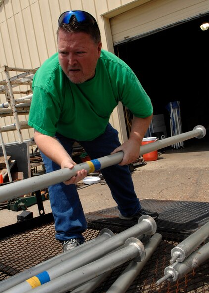 BARKSDALE AIR FORCE BASE, La. - Army Reservist Sgt. 1st Class Terrell Goodwin loads his truck with supplies from equipment rental in preparation for the holiday weekend festivities July 3. (U.S. Air Force photo by Airman 1st Class Joanna M. Kresge)