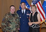 Tech. Sgt. Israel Del Toro, a tactical air control party member, poses with Leslie and  Gen. Stephen Lorenz, Commander of Air Education and Training Command, after the AETC change of commander ceremony July 3. (U.S. Air Force photo by Rich McFadden)