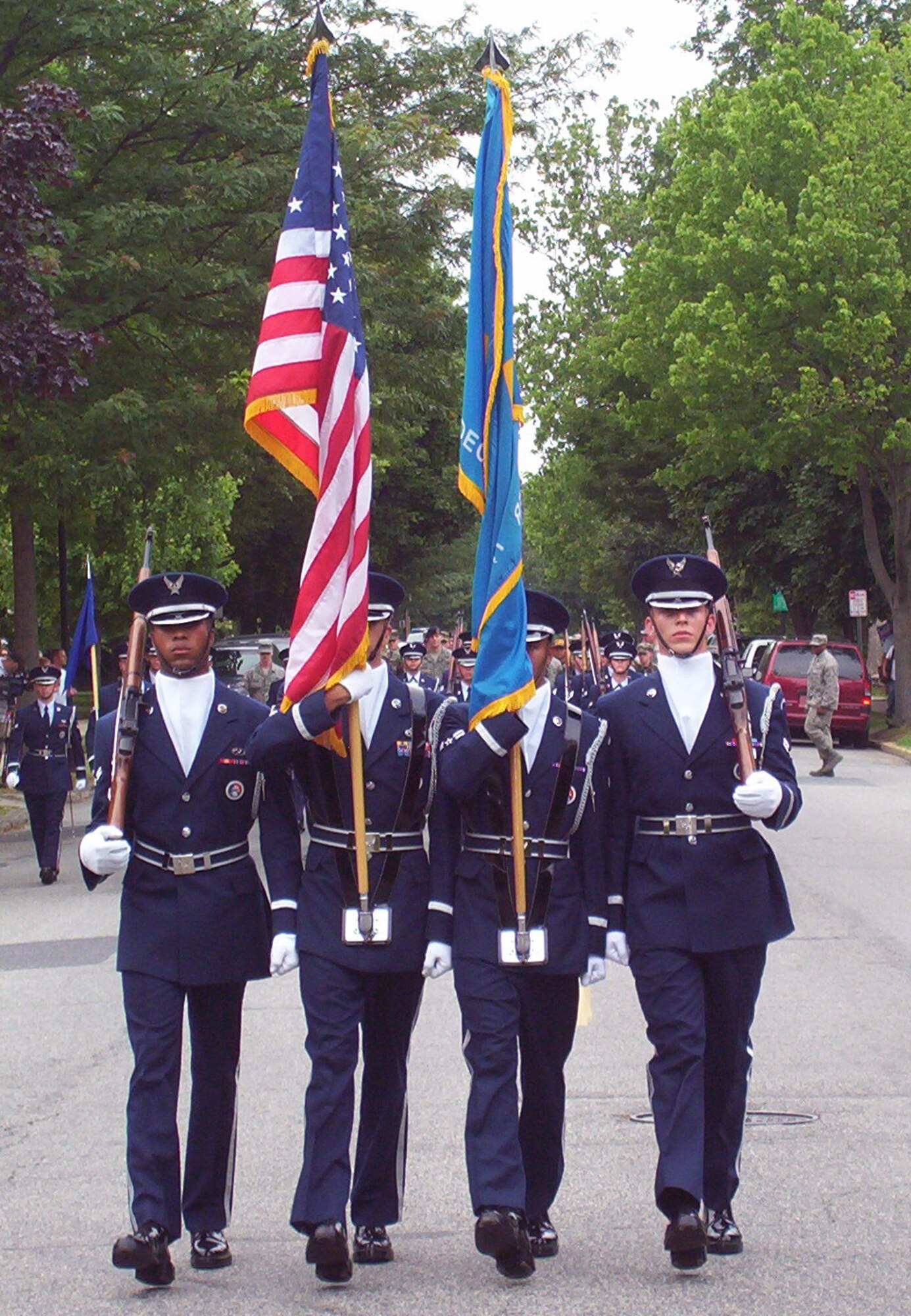 DOVER AIR FORCE BASE, Del. – Dover AFB Honor Guard members carry Old Glory and the Delaware state flag during the City of Dover’s Independence Day parade July 4 in downtown Dover. (Photo by Sue Walls)