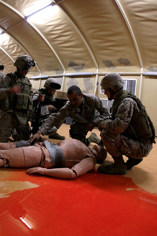 Marines with Combat Logistics Battalion 15, 15th Marine Expeditionary Unit, attended a Combat Lifesaver class at the Medical Simulation Training Center here.::r::::n::The focus of the training was to build upon lifesaving skills by subjecting the Marines to a series of simulated combat trauma exercises using lifelike manequins as trauma victims. These manequins breath, bleed out life like fluid and have a pulse similar to humans.::r::::n::The Camp Pendleton, Calif., based 15th MEU is currently conducting sustainment training in Kuwait until mid-July. (Official USMC photo by Staff Sgt. TG Kessler)(Released)
