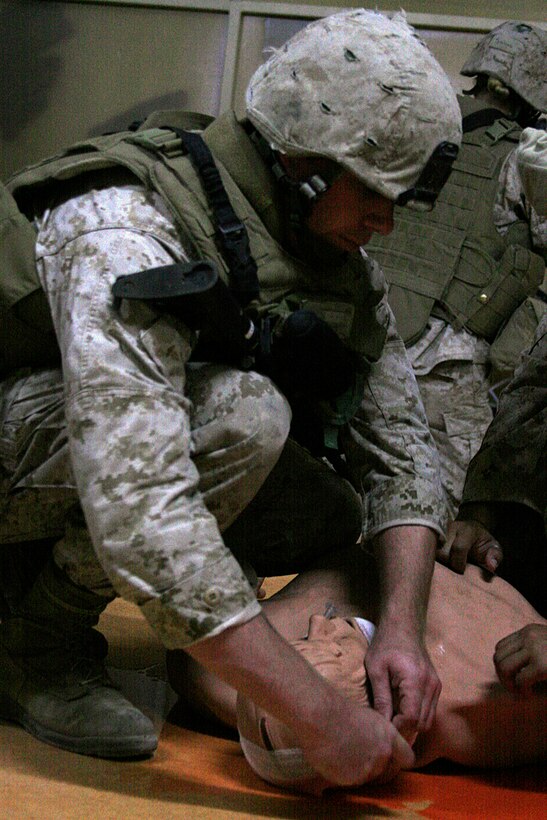 Marines with Combat Logistics Battalion 15, 15th Marine Expeditionary Unit, attended a Combat Lifesaver class at the Medical Simulation Training Center here.::r::::n::The focus of the training was to build upon lifesaving skills by subjecting the Marines to a series of simulated combat trauma exercises using lifelike manequins as trauma victims. These manequins breath, bleed out life like fluid and have a pulse similar to humans.::r::::n::The Camp Pendleton, Calif., based 15th MEU is currently conducting sustainment training in Kuwait until mid-July. (Official USMC photo by Staff Sgt. TG Kessler)(Released)