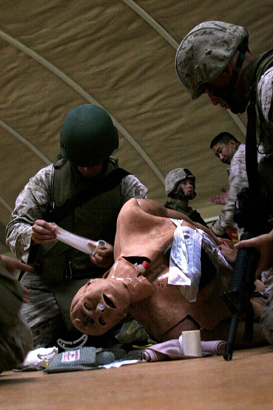 Marines with Combat Logistics Battalion 15, 15th Marine Expeditionary Unit, attended a Combat Lifesaver class at the Medical Simulation Training Center here.::r::::n::The focus of the training was to build upon lifesaving skills by subjecting the Marines to a series of simulated combat trauma exercises using lifelike manequins as trauma victims. These manequins breath, bleed out life like fluid and have a pulse similar to humans.::r::::n::The Camp Pendleton, Calif., based 15th MEU is currently conducting sustainment training in Kuwait until mid-July. (Official USMC photo by Staff Sgt. TG Kessler)(Released)