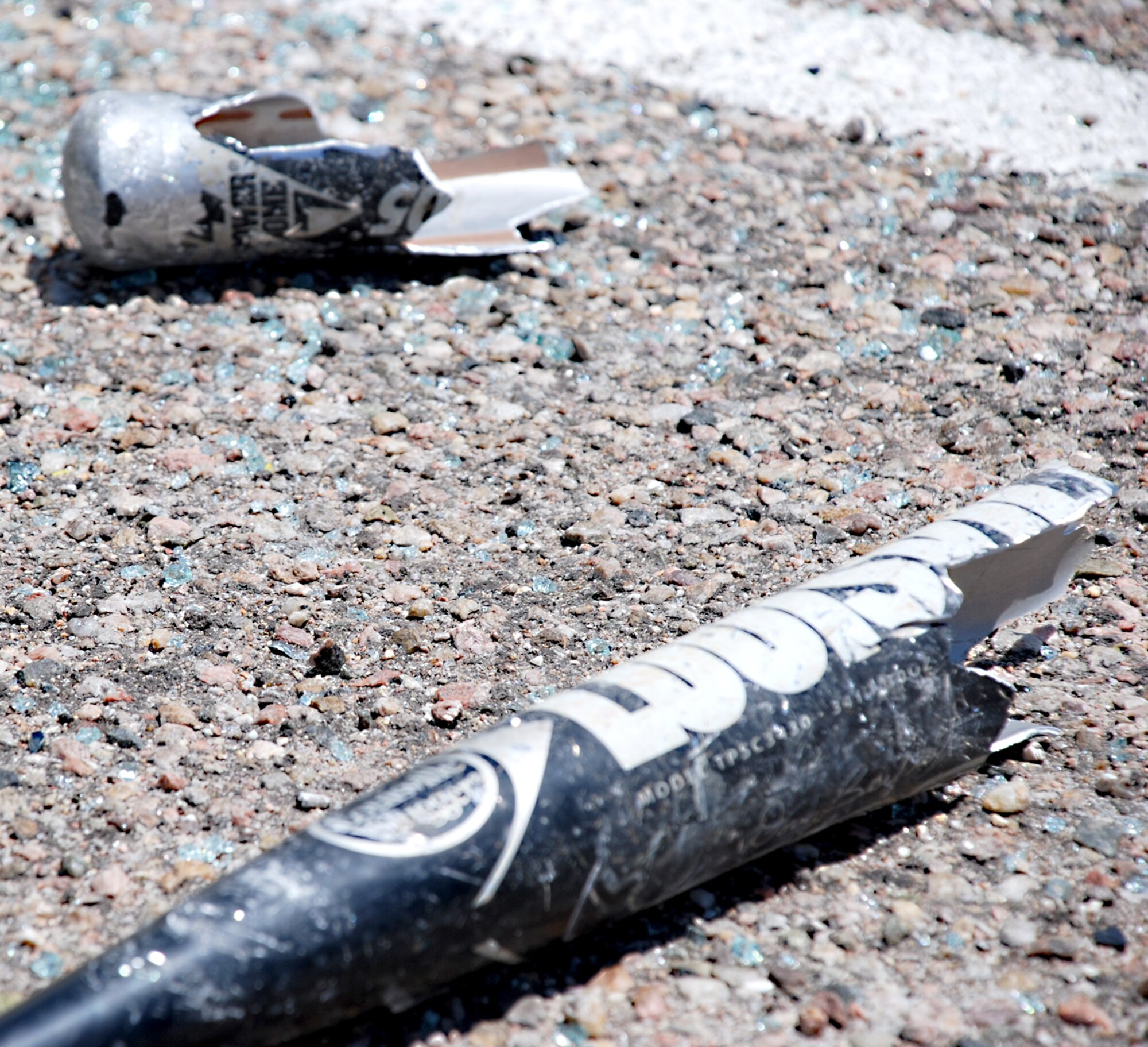 An aluminum bat snapped in half when hit against a vehicle during the Block Party June 20. The bat was one of four weapons people could choose from to destroy the car: sledgehammer, pickaxe, crowbar and the bat.