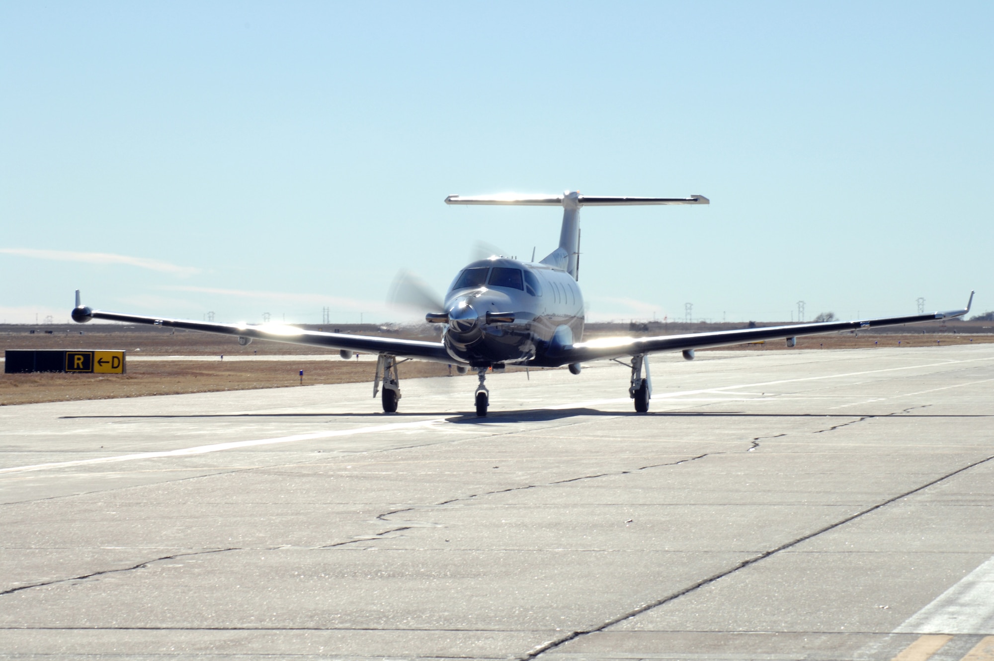 A PC-12 Pilatus, like the one pictured, crashed at about 11:30 p.m. July 8 on the runway at Hurlburt Field, Fla. The three people on board the aircraft were uninjured. (U.S. Air Force photo/Airman 1st Class Evelyn Chavez)