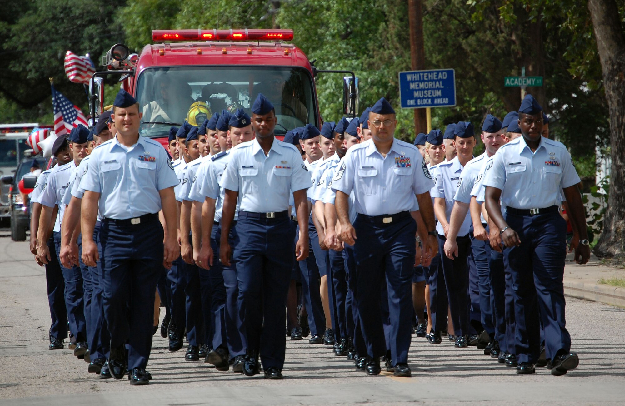 LAUGHLIN AIR FORCE BASE, Texas--Members of the 47th Flying Training Wing march in Del Rio’s Fourth of July parade down Main Street July 4.  More than 110 Airmen from Laughlin represented the Air Force and participated in the parade.  The event was one of the many that took place in the local area to celebrate Independence Day.  (U.S. Air Force photo by 1st Lt. Courtney Kippenberger)  