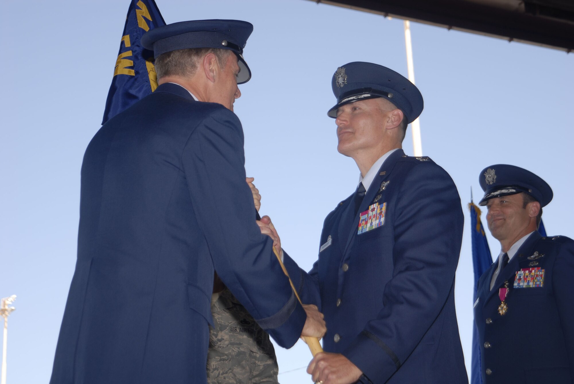Maj. Gen. Irving Halter, Jr., 19th Air Force commander, served as the reviewing official during the 56th Fighter Wing change of command ceremony at Luke AFB, July 9. Brig. Gen. Jones relinquished command to Col. Kurt Neubauer. (U.S. Air Force photo by MSgt. Gomez)