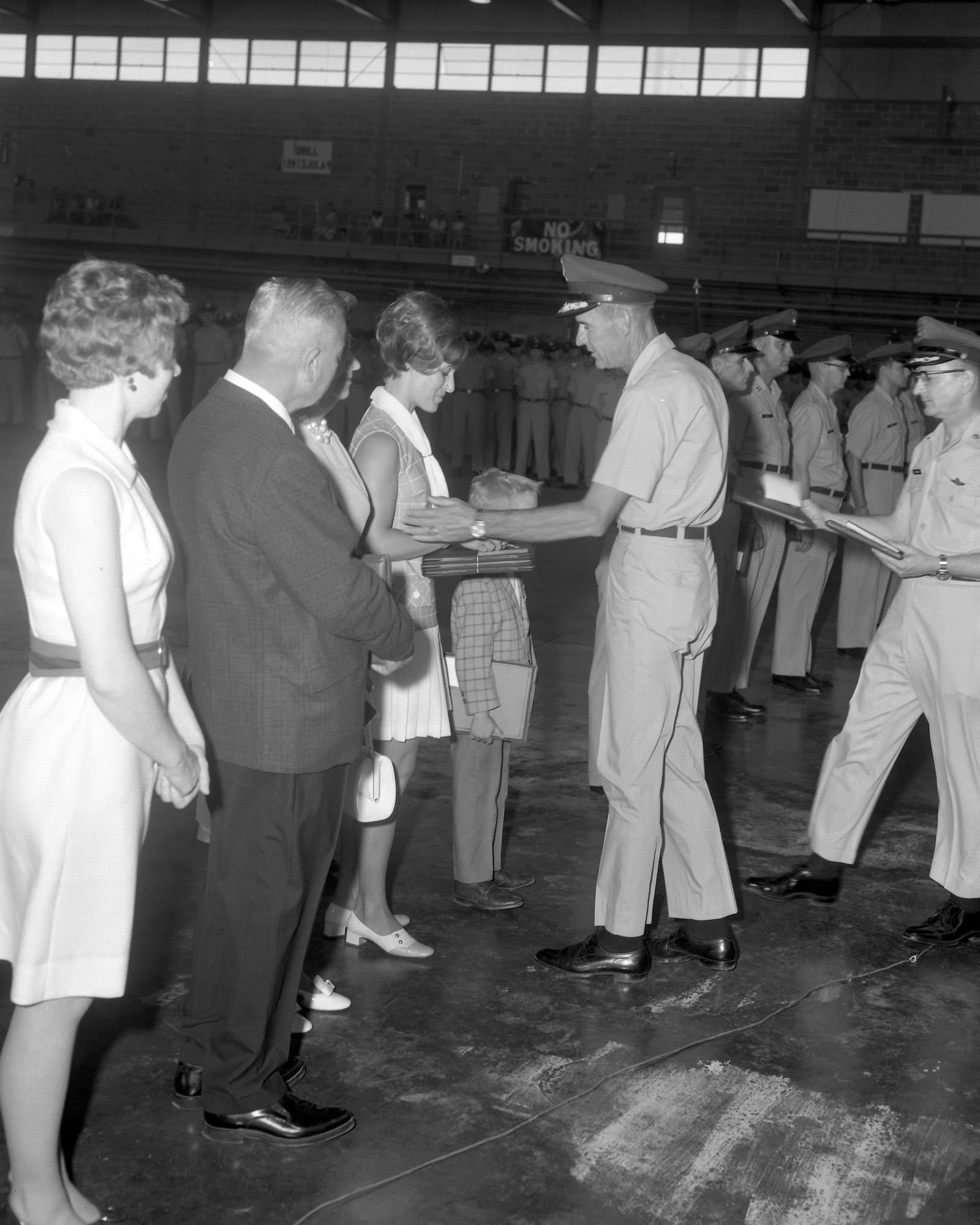 Patricia Brown, widow of LT Warren Brown, receives awards posthumously at an event honoring her late husband, held in Sioux City, Iowa on May 28, 1969.

On 14 July 1968, 1st Lt Warren K. Brown was on an air strike mission in the AShau Valley. (Vietnam) As he made his pass over the target area, his aircraft was hit by ground fire. He headed in an easterly direction and bailed out shortly afterwards as his aircraft was on fire. During the ejection, there was a chute entanglement and the pilot was found deceased in his chute harness by a helicopter crew.?
Brown was the only pilot of the Sioux City based 185th Tactical Fighter Group to be killed in Vietnam. (The 185th TFG was mobilized on January 26, 1968 and returned to Sioux City on the 14th of May 1969.)
 
