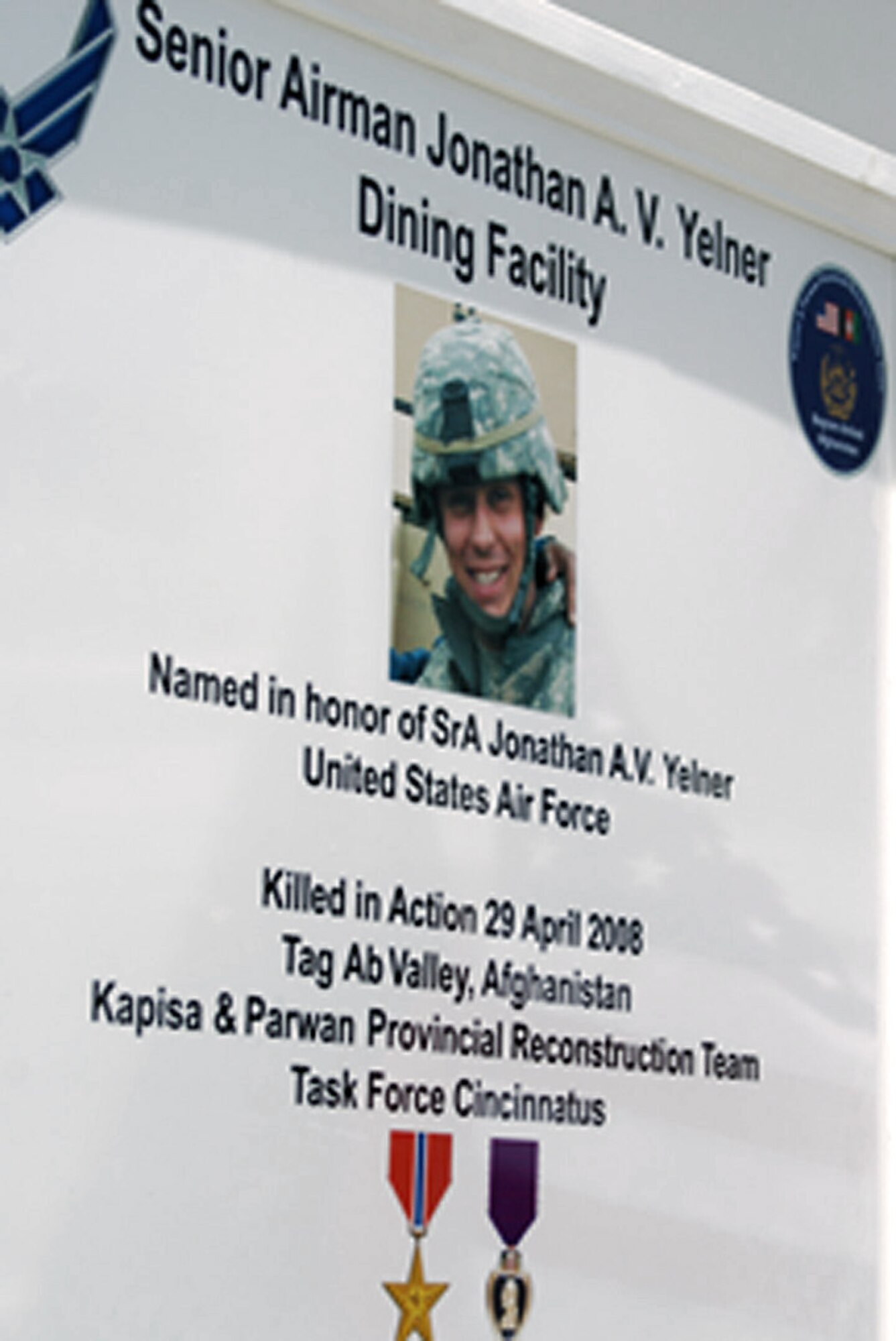 The Senior Airman Jonathan A.V. Yelner Dining Facility was opened July 6 on Bagram Air Field, Afghanistan. Airman Yelner, deployed from Ellsworth Air Force Base, S.D., was killed April 29 when an improvised explosive device detonated underneath his vehicle in Tag Ab Valley, Kapisa Province, Afghanistan. (U.S. Army photo/Capt. Elizabeth Casebeer)