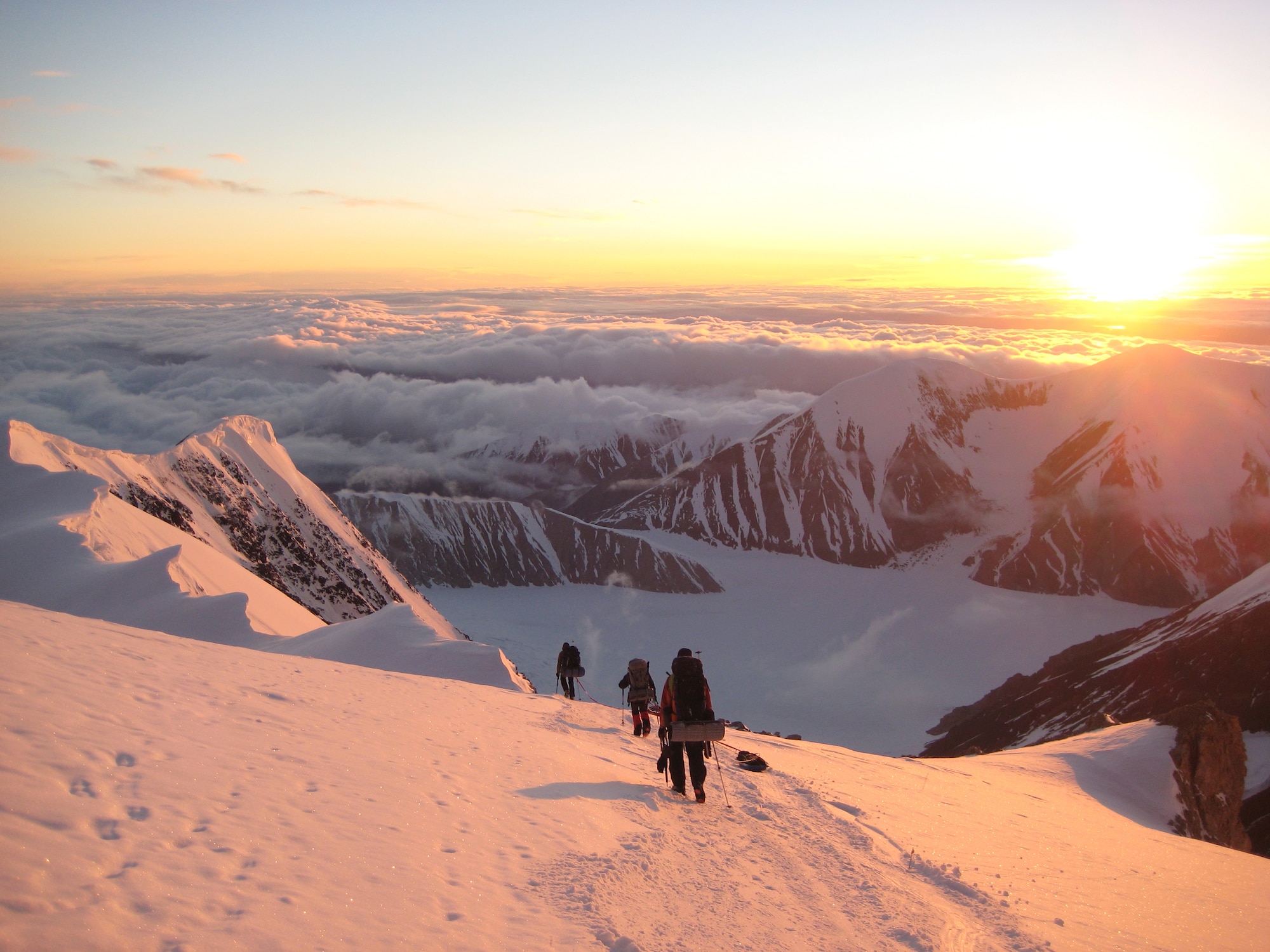 DYESS AIR FORCE BASE, Texas -- The Seven Summits Challenge team begins ther descent down Mount McKinley, Alaska, in early June. The team of six Airmen meet in Alaska and began to scale the 20,320 foot mountain to its summit May 30. The team completed the challenge in 14 days. (U.S. Air Force photo)