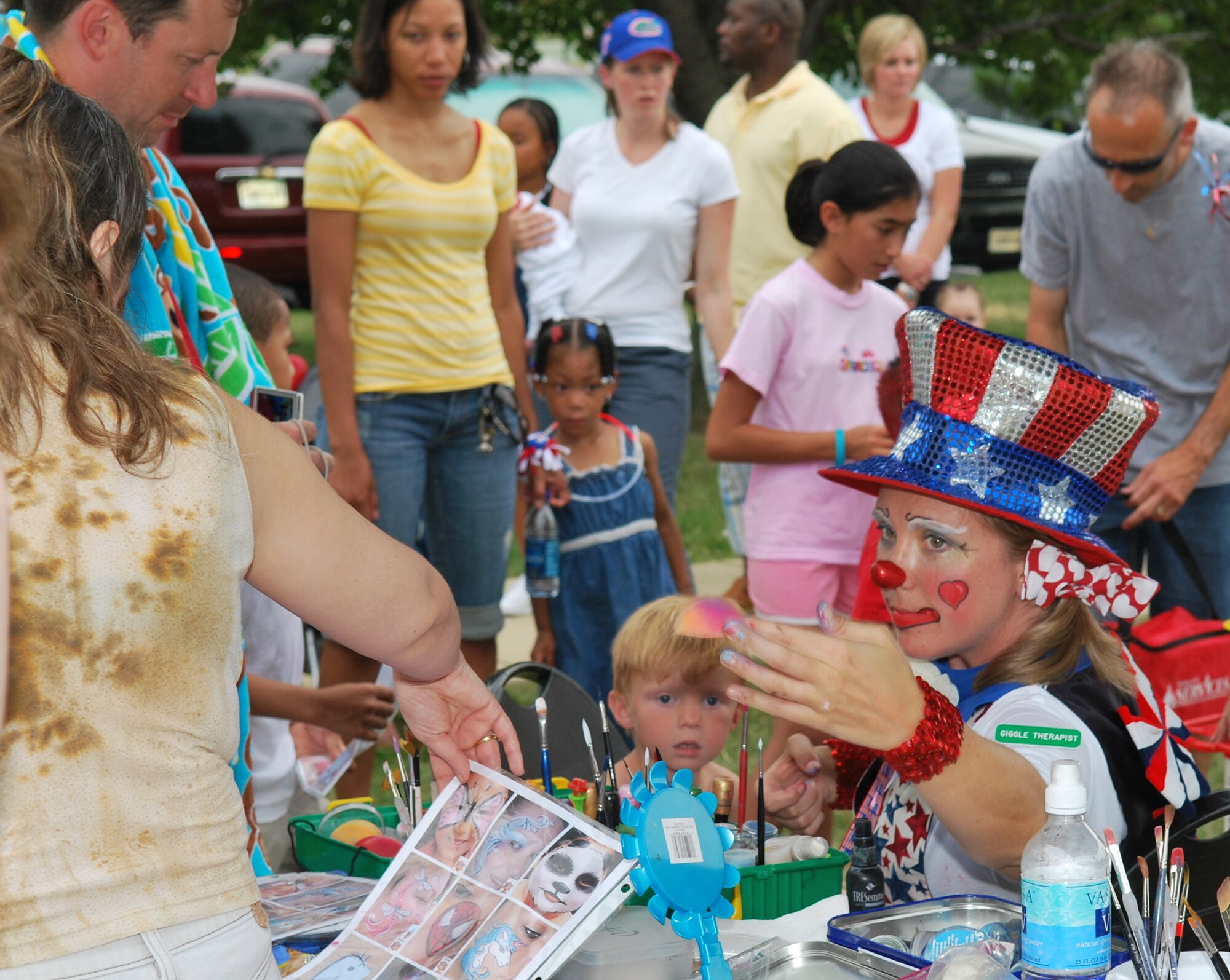 Sweet Pickles interacts with the Bolling community July 4 during the 6th Annual Freedom Fest at Bolling Green Park. (U.S. Air Force photo by Senior Airman Edward Carr)