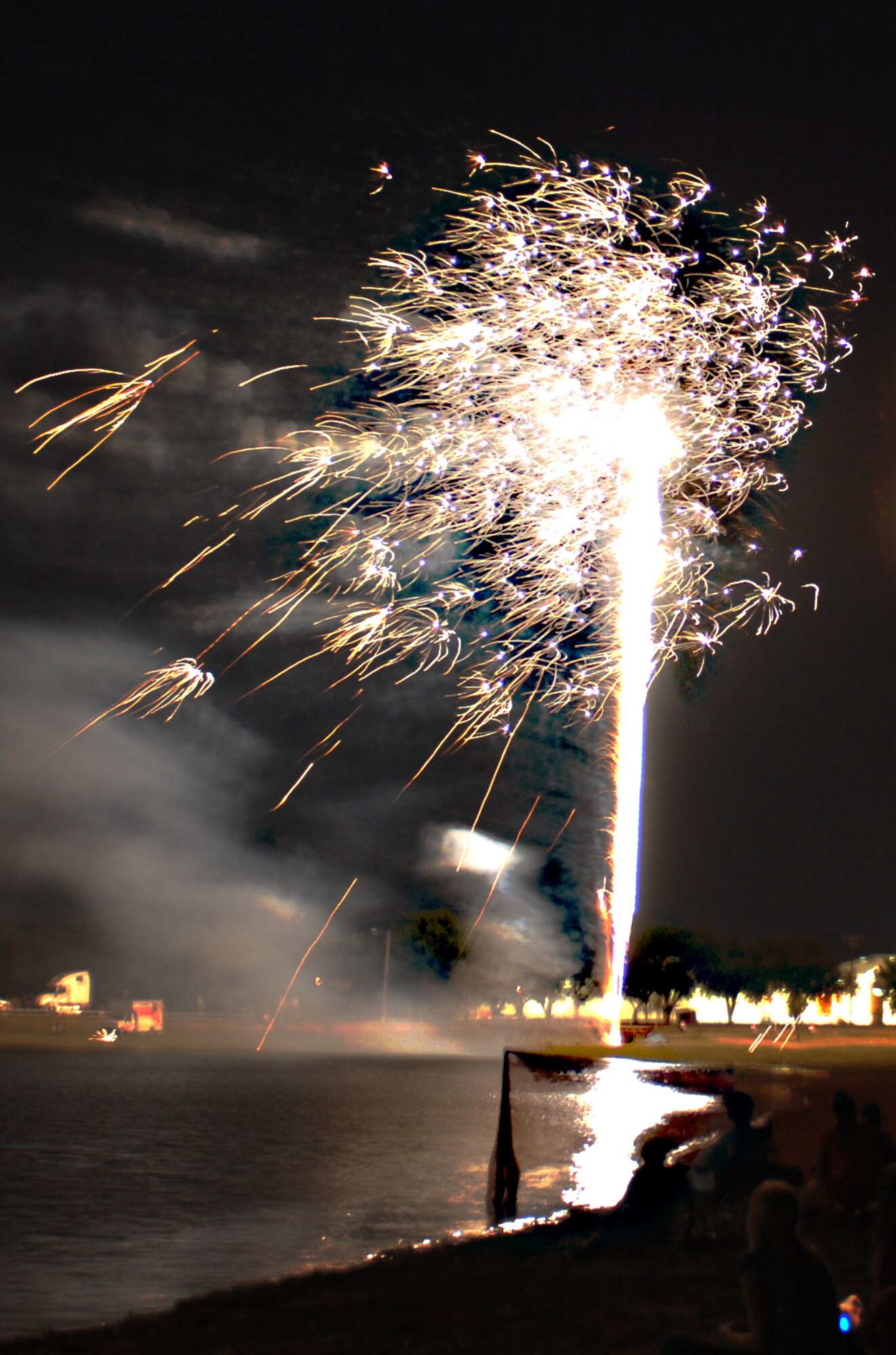 CANNON AIR FORCE BASE, N.M. -- Fireworks light up the sky at Green Acres Park in nearby Clovis, N.M. July 4. Thousands of residents viewed the annual Smoke on the Water show near the lake. (Air Force photo by Greg Allen) 