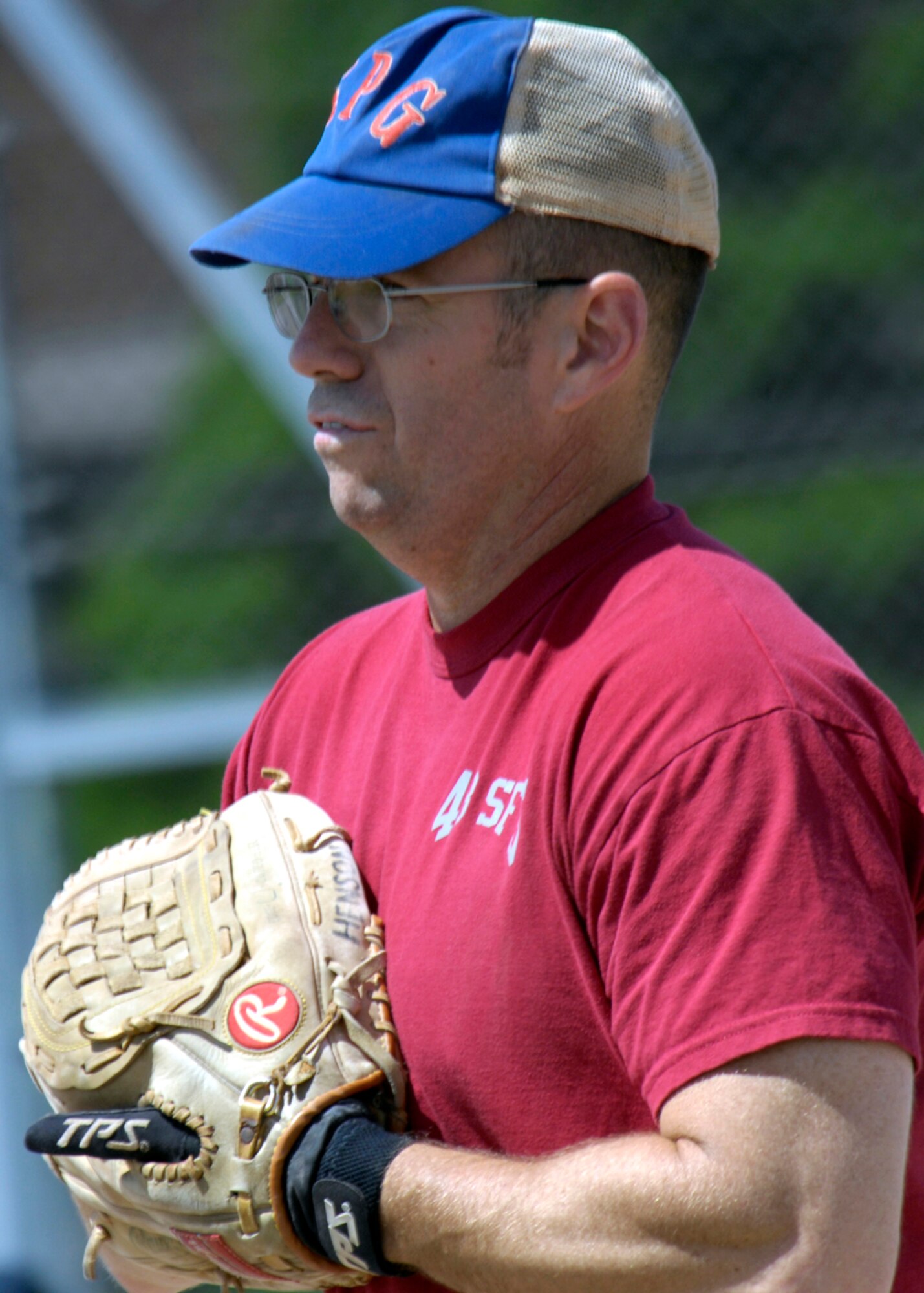 Chief Master Sgt. Robert Henson, 48th Security Forces chief enlisted manager mans the outfield during the Chiefs Vs. Eagles softball game July 4 at RAF Feltwell. The chiefs beat the eagles 28 to 11 for the first time since 2003. (U.S. Air Force photo by Airman Perry Aston) 