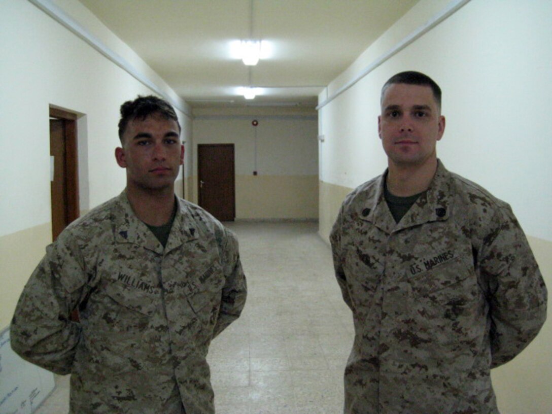 FALLUJAH, Iraq (June 25, 2008) Cpl. John Williams (left), a section leader with Mobile Section, Company I, 3rd Battalion, 6th Marines, and Staff Sgt. William Willis, platoon sergeant, 3rd Platoon, cross paths again in the fleet after Willis was the senior drill instructor for Williams in recruit training. The two were in Platoon 1012, Company B, 1st Battalion, at Marine Corps Recruit Depot, Parris Island, S.C. They now serve together in Iraq with a history of challenges behind them. (Official U.S. Marine Corps photo by Cpl. Chris Lyttle) (RELEASED)