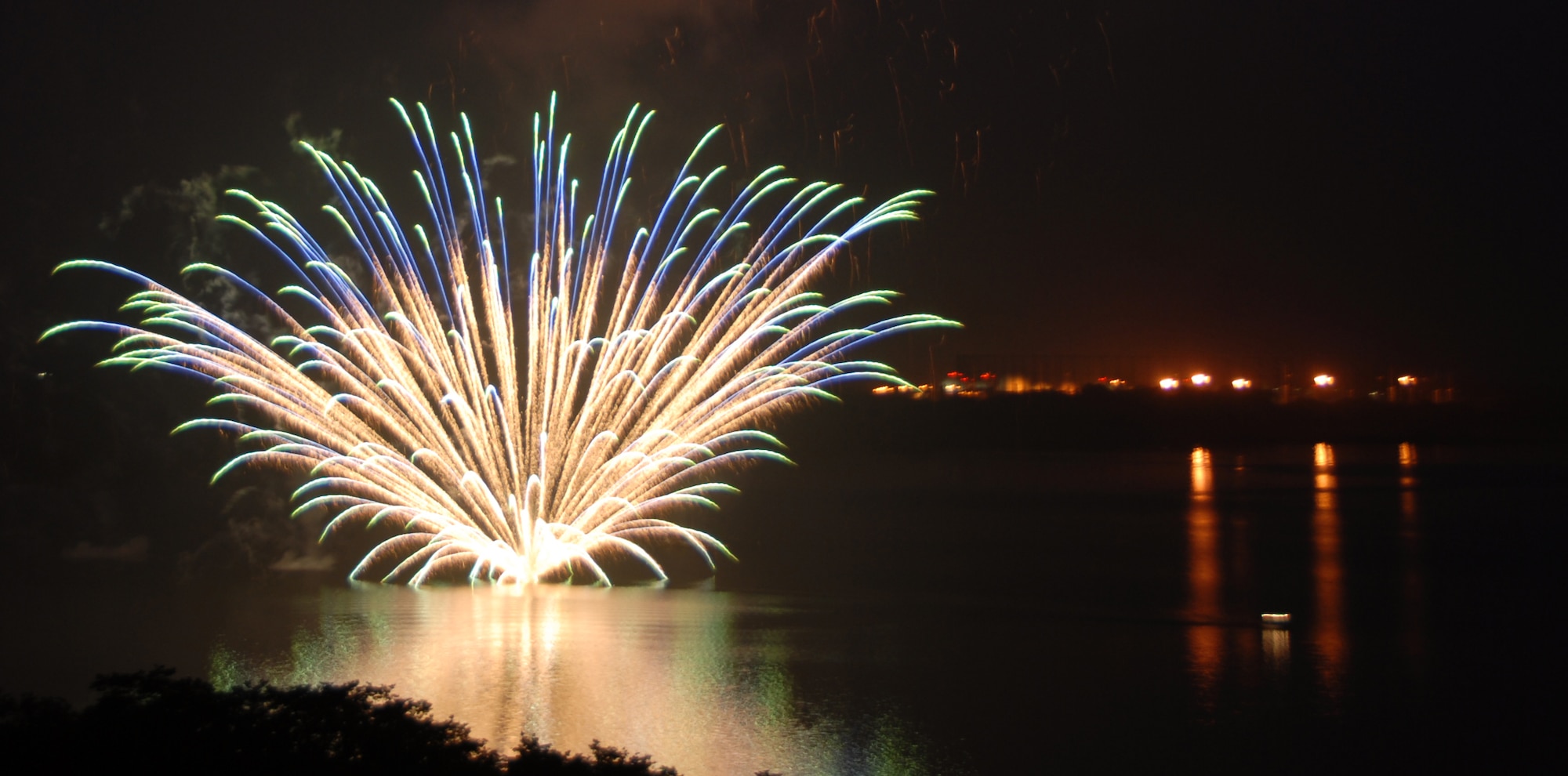 MISAWA AIR BASE, Japan -- Fireworks light up the night sky over Lake Ogawara July 4.  Freedom Fest is held annually to give Misawa residents a chance to celebrate Independence Day away from the U.S.  (U.S. Air Force photo by Tech. Sgt. Russell McBride)