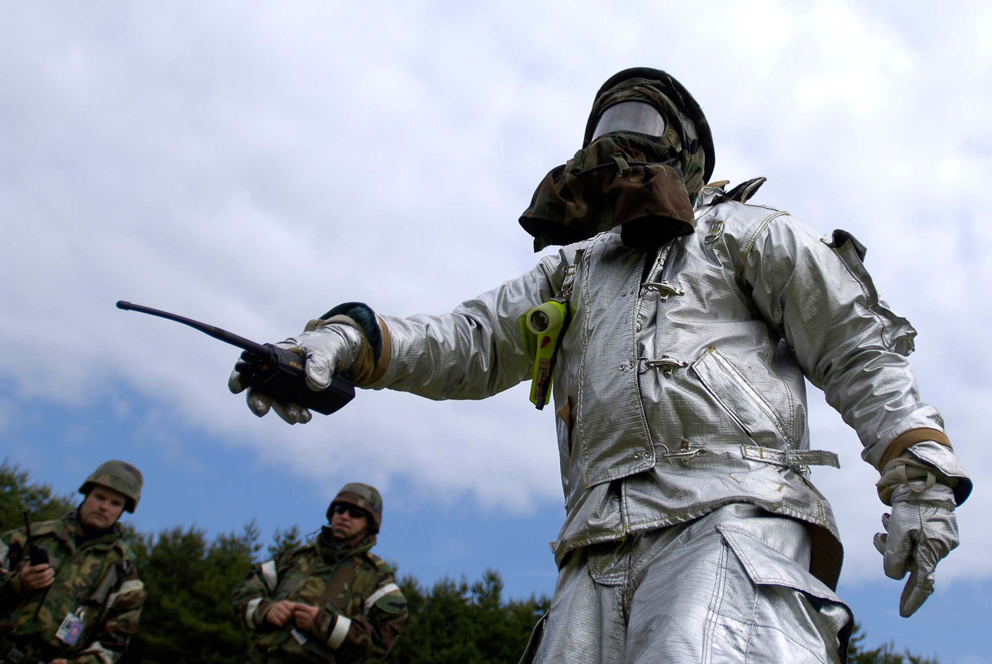 MISAWA AIR BASE, Japan -- A firefighter from the 35th CES directs his Airmen after a simulated attack during exercise Beverly Sunrise June 26, 2008.  Firefighters were tested with various scenarios during the three-day exercise. (U.S. Air Force photo by Senior Airman Chad Strohmeyer)