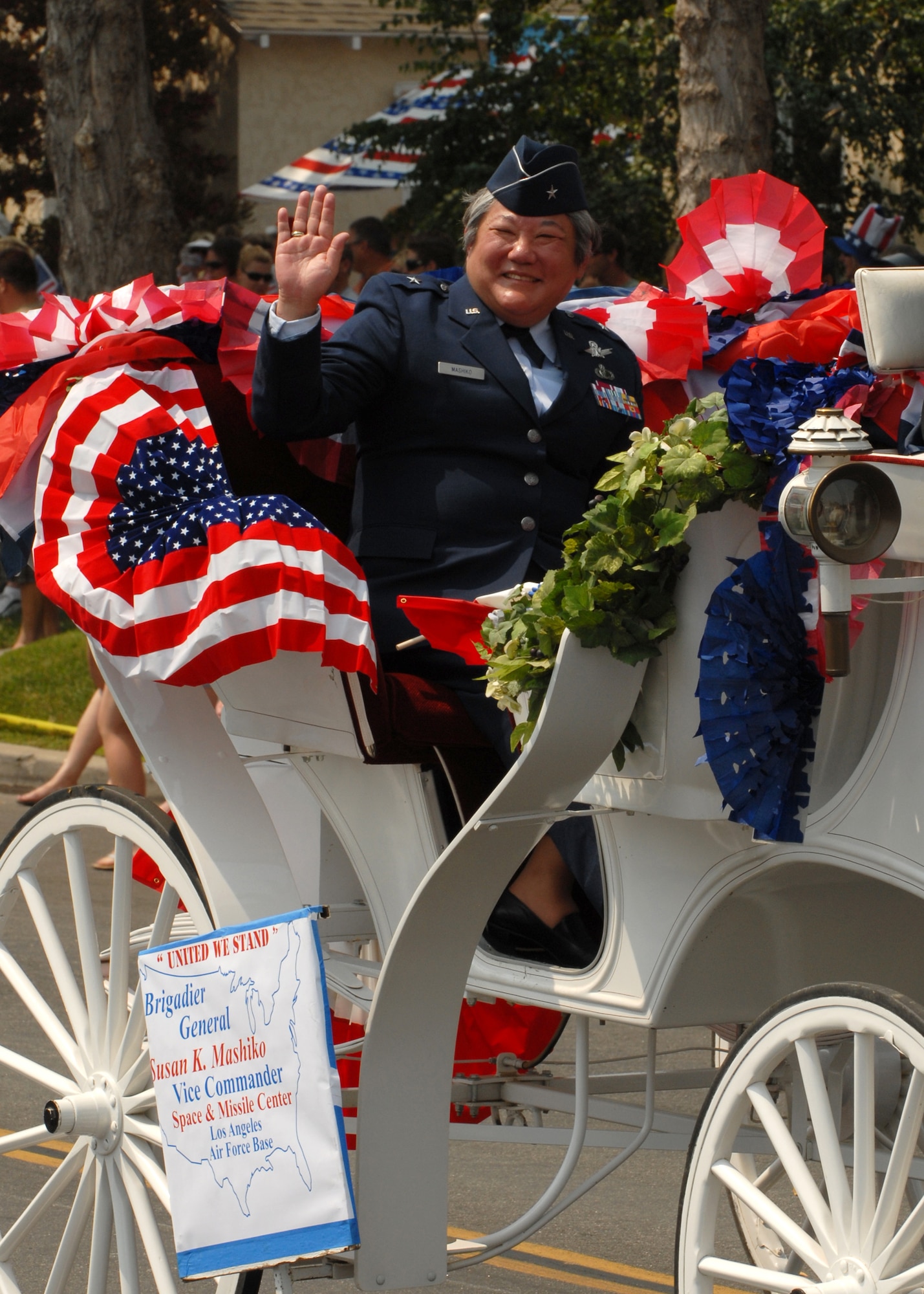 More than 300,000 people lined the streets of Huntington Beach as Brig. Gen. Susan Mashiko, Space and Missile Systems Center vice commander, represents Los Angeles Air Force Base at the city's Fourth of July parade.  (Photo by Steven Schester)