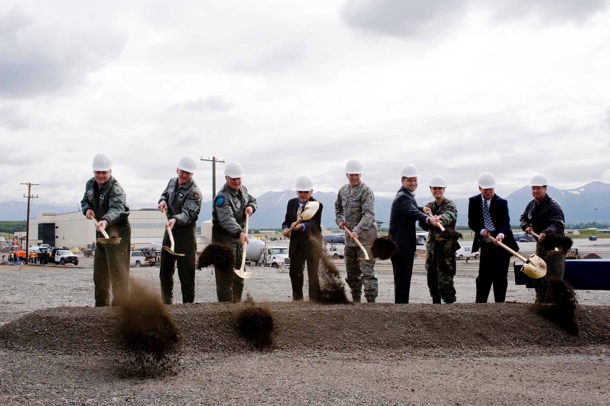 ELMENDORF AIR FORCE BASE, Alaska -- Members of Air Force and local leadership break ground on the 176th Wing here June 30. Kulis Air National Guard base, currently collocated with Ted Stevens International Airport, is set to be moved from their current location to Elmendorf by 2011. (U.S. Air Force photo/Senior Airman Jonathan Steffen)