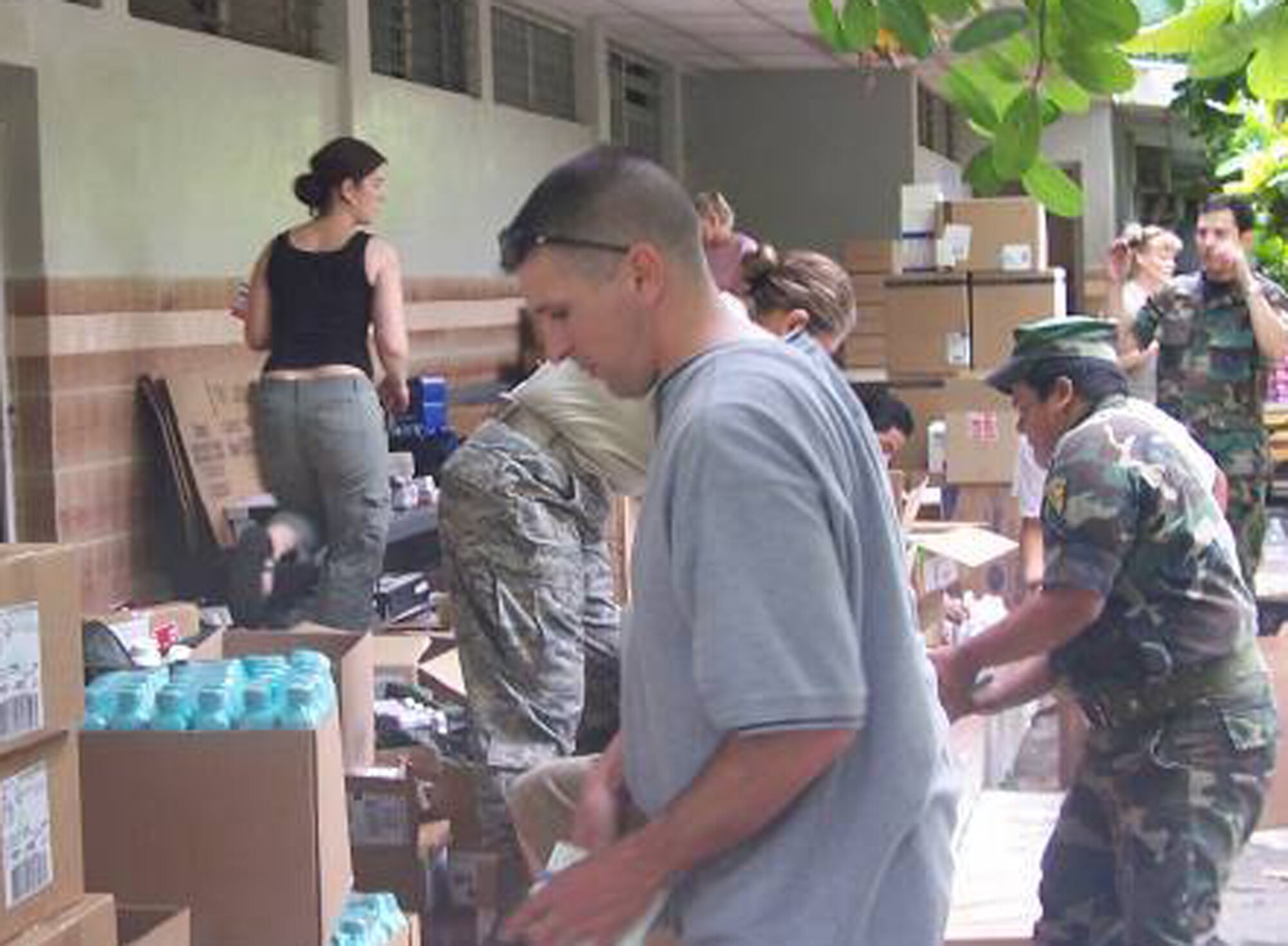 Capt. Doug Smith, 21st Medical Group nurse practitioner, helping to sort medications and supplies in San Miguel, El Salvador. Members of the 21st Medical Group are supporting the Central American exercise as part of an ongoing U.S. Southern Command exercise. (U.S. Air Force photo)