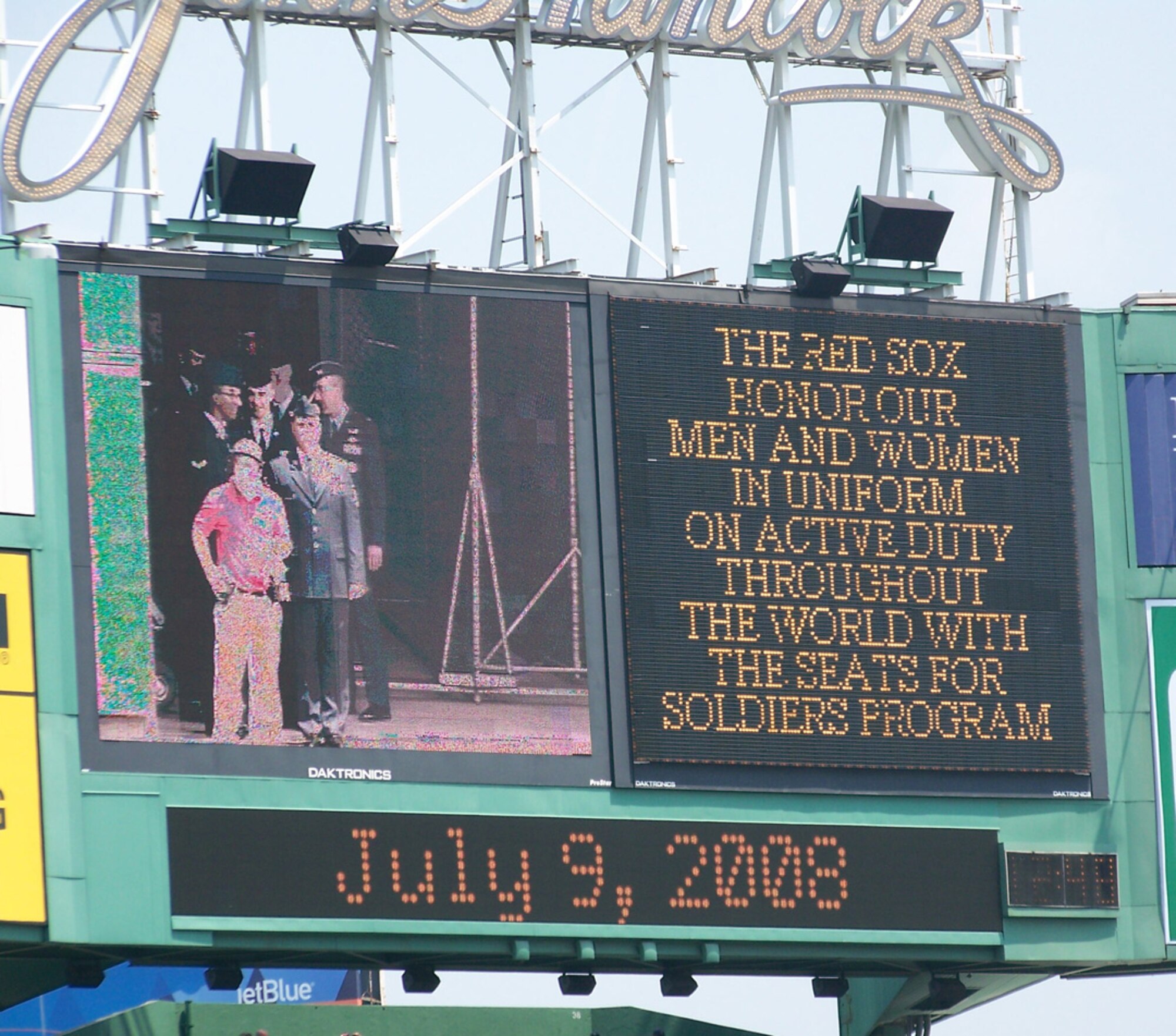 The scoreboard at Fenway Park in Boston shows troops from Hanscom who performed pre-game ceremonies at yesterday's Boston Red Sox-Minnesota Twins game. About 200 Airmen from Hanscom, as well as other service members from the local area, attended the game for free as part of the 'Seats for Soldiers' program, in which season ticket holders donated their game tickets to active-duty troops. The Red Sox routed the Twins 18 to 5.   (Photo by U.S. Army Sgt. Alicia Altman)
