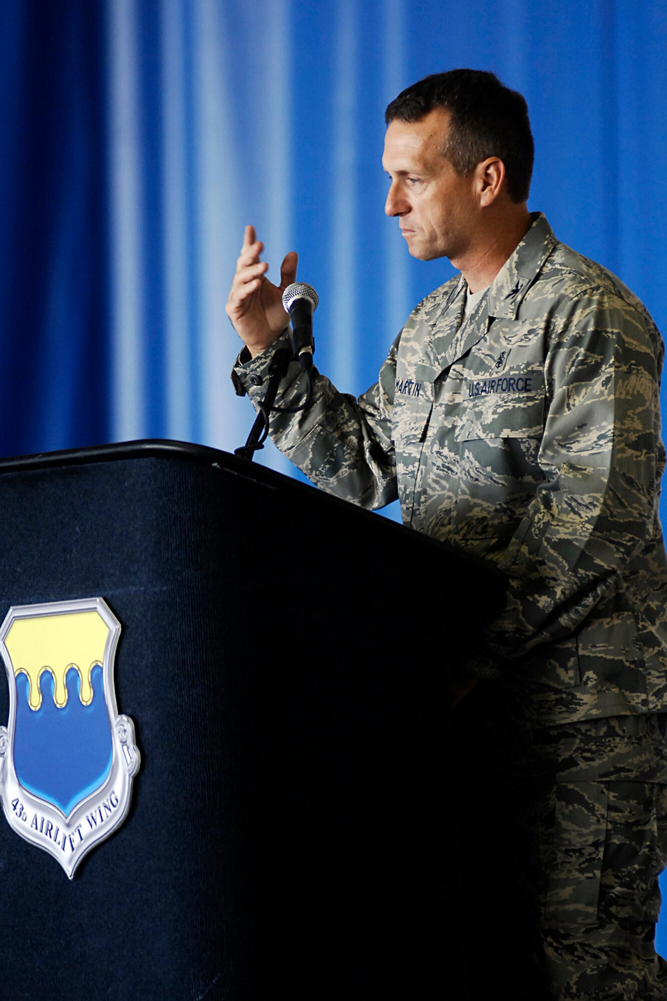 Col. Paul Martin, 43rd Medical Group Commander, speaks to the audience after assuming command July 1. (U.S. Air Force Photo by Mike Murchison)