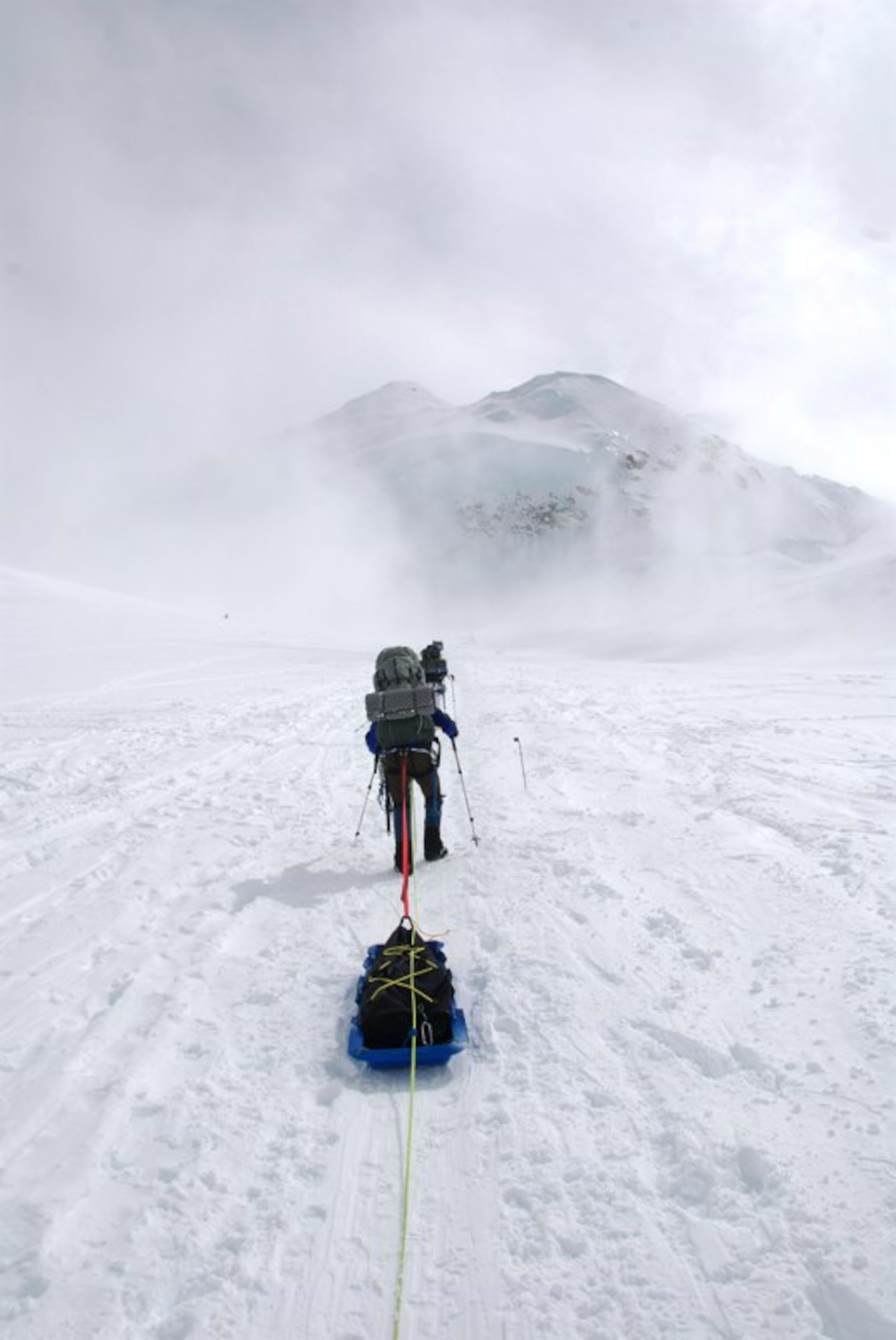 A member of the Seven Summits Challenge hauls his gear up the side of Mt. McKinley, Alaska. Mt. McKinley is the highest peak in North America and a six-man Air Force team climbed the mountain in June. (Courtesy photo)