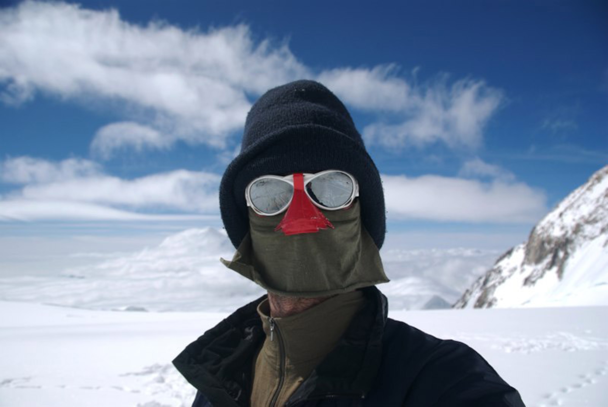 Capt. Grayon Muller, 40th Helicopter Squadron pilot, showcases his cold weather mask and goggles while climbing Mt. McKinley, Alaska. The climb is part of the Seven Summits Challenge in which Air Force members climb the highest mountain on each continent. Mt. McKinley was the second climb Captain Muller has participated in so far. (Courtesy photo)