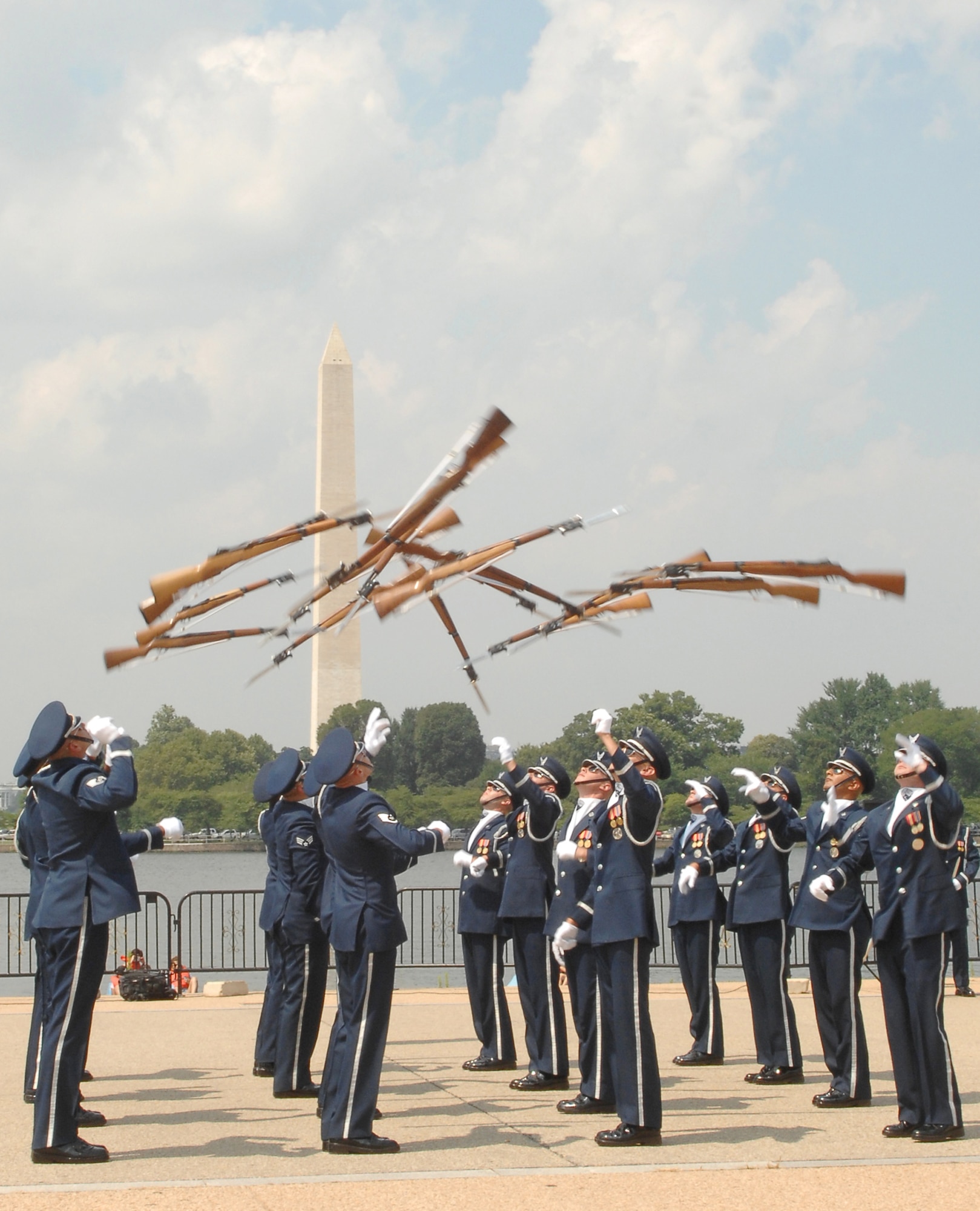 The U.S. Honor Guard Drill Team performs as part of the team's Summer Drill Series July 8 at the Jefferson Memorial in Washington. The team will perform around the National Capitol Region until July 29. For more information about the 2008 performances, logon to www.honorguard.af.mil/drillteam/. (U.S Air Force photo by Senior Airman Alexandre Montes)