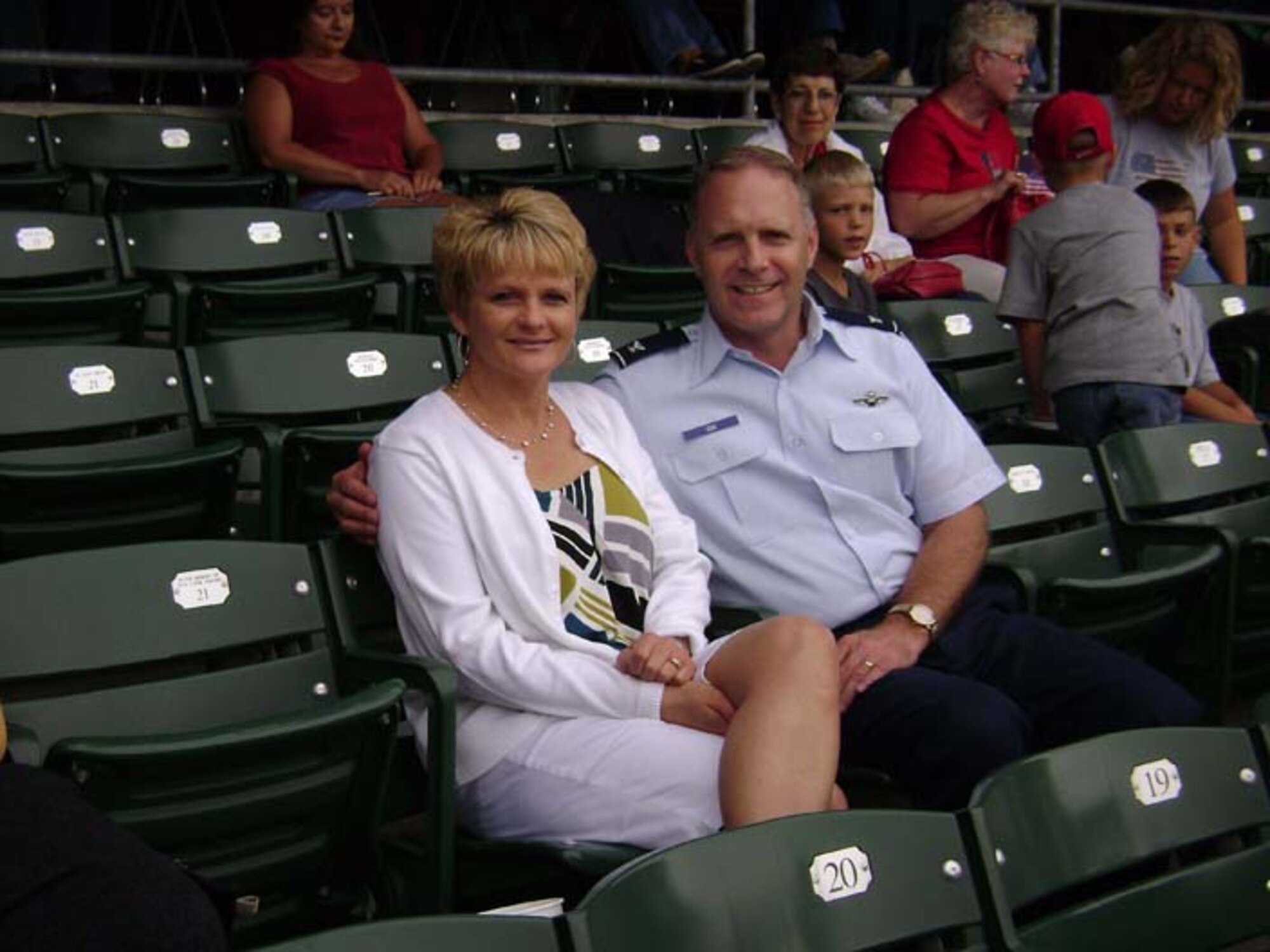 INDIANAPOLIS, Ind., -- Colonel and Mrs. Tim Cox take in the sights at Victory Field, home of the Indianapolis Indians baseball team.  Colonel Cox is the 434th Air Refueling Wing vice commander. The Grissom Air Reserve Base Honor Guard participated in the opening ceremony and Colonel Cox and his wife were part of a group of Grissom personnel on hand to watch the event. (U.S. Air Force photo/Chief Master Sgt. Jeff Mercier)                    