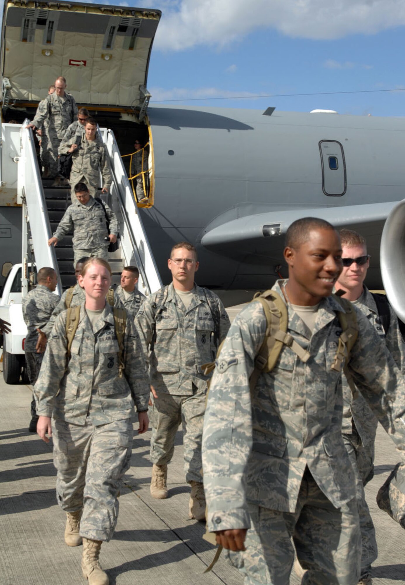RAF MILDENHALL, England -- Members of the 100th Security Forces Squadron return to Mildenhall after a six month deployment. These Airmen were assigned to the 732nd Expeditionary Security Forces Squadron, Detachment 4, where they performed traffic control point checks in the International Zone, Baghdad, Iraq. (U.S. Air Force photo by Master Sgt. Sarah Frankenhoff)
