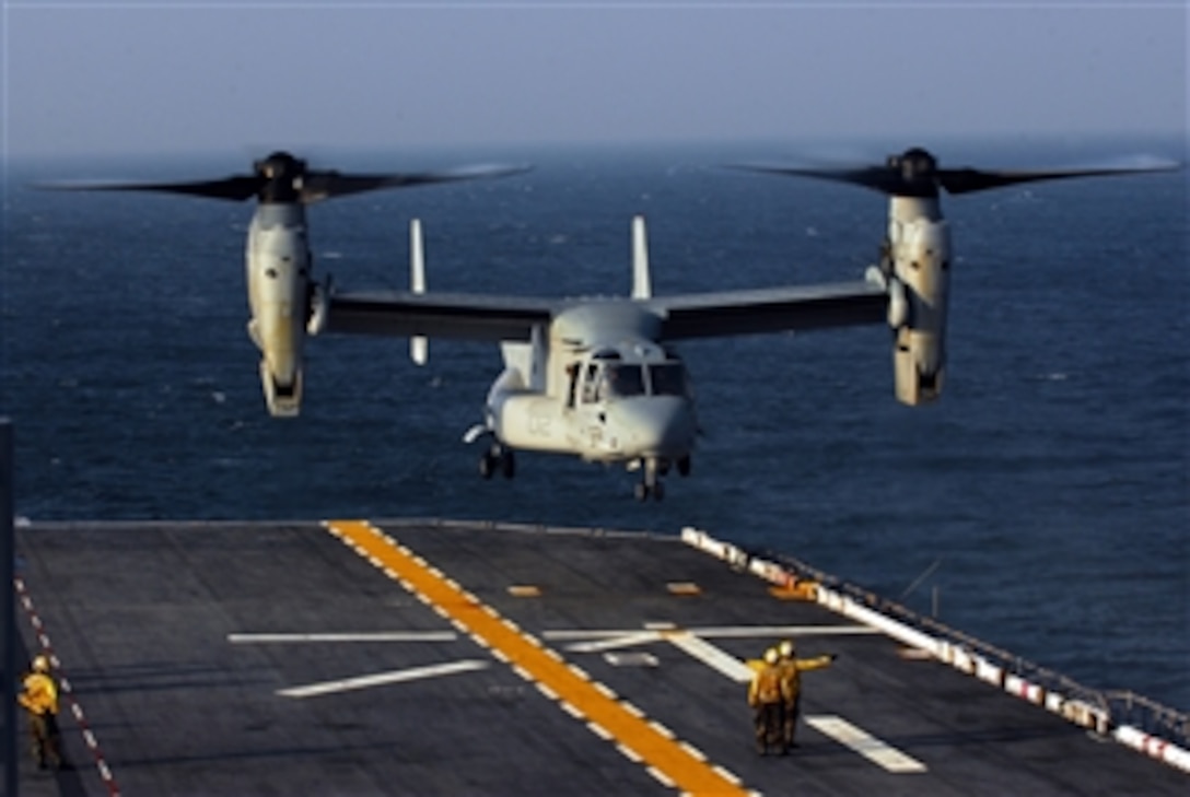 A V-22 Osprey aircraft assigned to Marine Medium Tiltrotor Squadron 263 lands on the flight deck of the multipurpose amphibious assault ship USS Bataan (LHD 5) while underway in the Atlantic Ocean on July 8, 2008.  