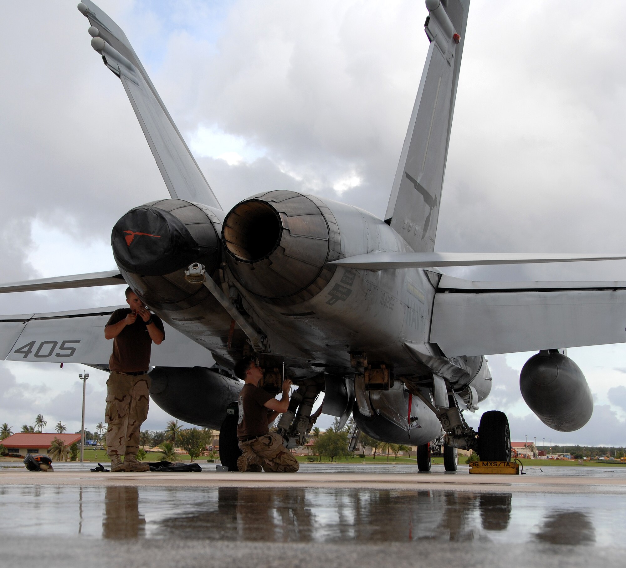 A U.S. Navy F/A-18 rests on Andersen July 10 before its departure Saturday afternoon. During this time, the fighters maintenance crew did routine maintenance on all F/A-18 jets. The fighters used Andersen waypoint on their way to Royal Australian Air Force Base Tindal where they will participate in an exercise with the Australians. (U.S. Air Force photo by Airman 1st Class Courtney Witt)
 