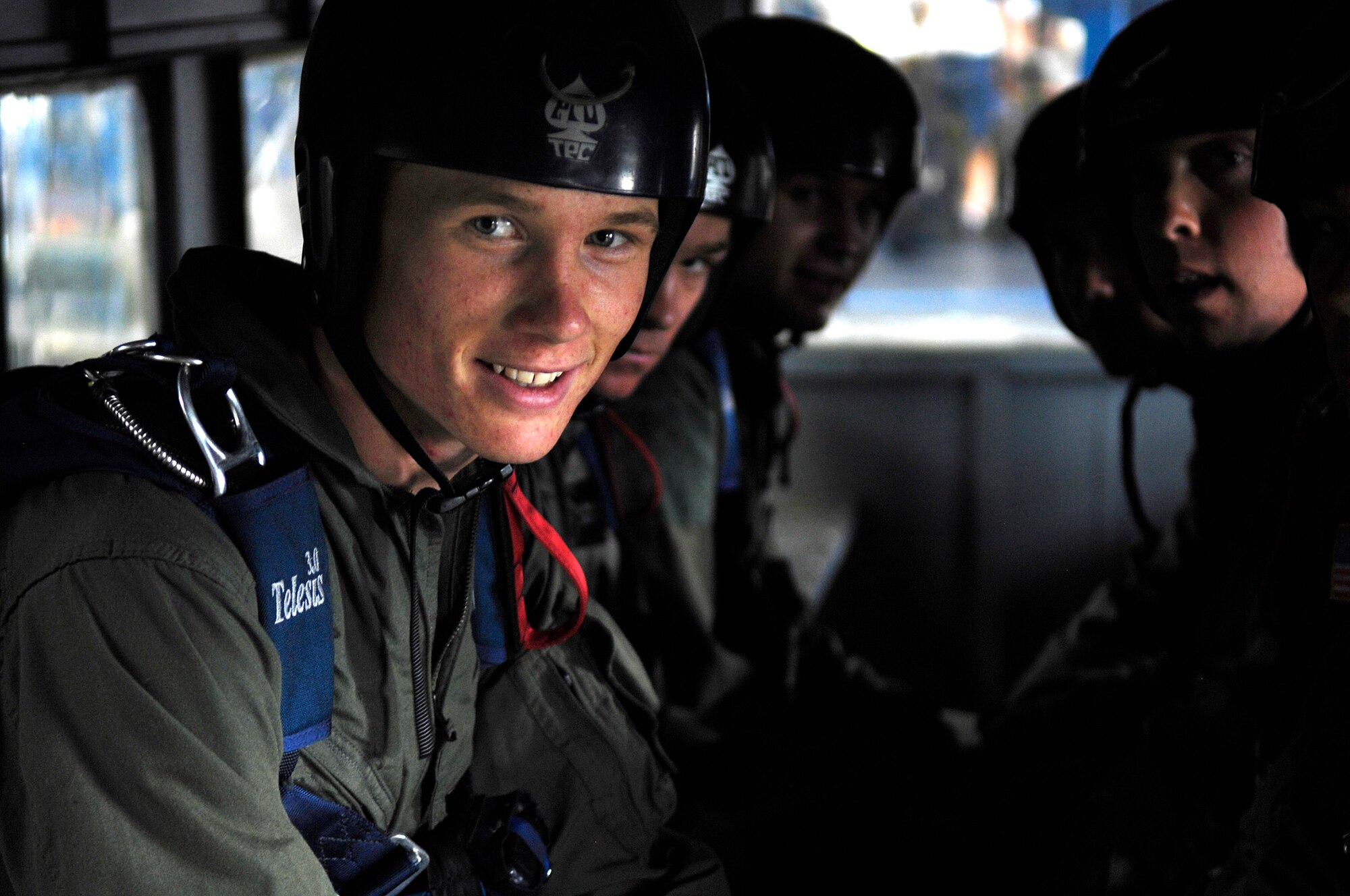 U.S. Air Force Academy Cadet 3rd Class Elliot Noon and several other cadets sit in the Twin Otter aircraft July 7 awaiting take off.  They are completing Airmanship 490, Basic Parachuting, an airmanship program where cadets earn their basic jump wings after successfully completing five free-fall jumps.  (U.S. Air Force photo/Mike Kaplan)