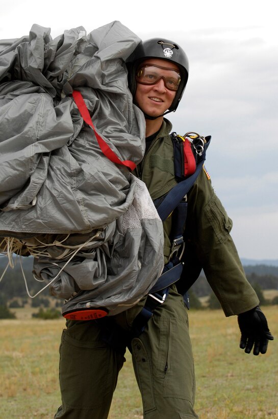 U.S. Air Force Academy Cadet 3rd Class David Barron smiles after completing his fourth free-fall jump July 7 during Airmanship 490, Basic Parachuting, an airmanship program where cadets earn their basic jump wings after successfully completing five free-fall jumps.  (U.S. Air Force photo/Mike Kaplan)