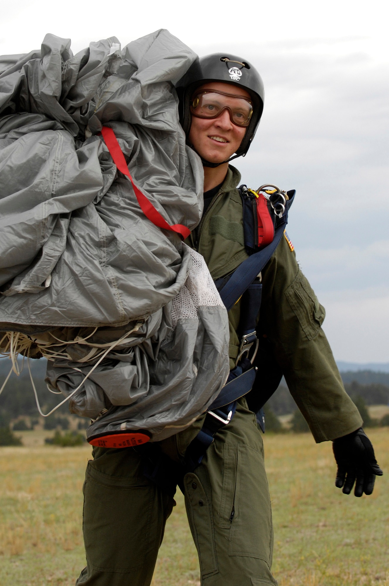 U.S. Air Force Academy Cadet 3rd Class David Barron smiles after completing his fourth free-fall jump July 7 during Airmanship 490, Basic Parachuting, an airmanship program where cadets earn their basic jump wings after successfully completing five free-fall jumps.  (U.S. Air Force photo/Mike Kaplan)