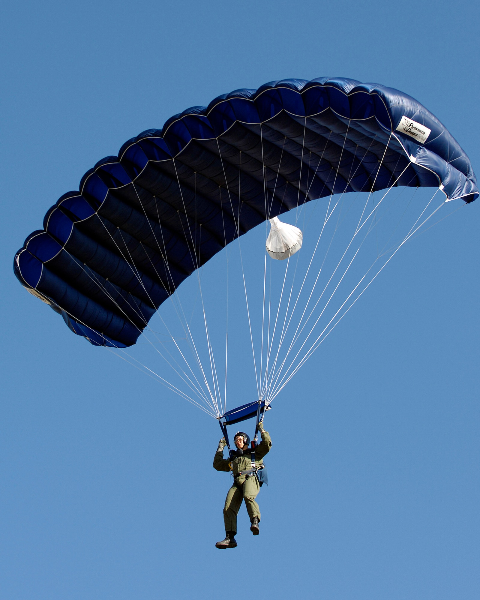 U.S. Air Force Academy Cadet Harrison Marble makes a jump from 4500 feet above the academy on June 27 during Airmanship 490, Basic Parachuting, an airmanship program where cadets earn their basic jump wings after successfully completing five free-fall jumps.  (U.S. Air Force photo/Mike Kaplan)