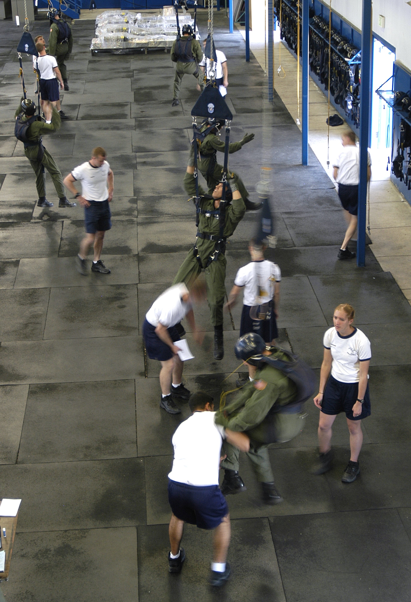 Third-class cadets at the U.S. Air Force Academy receive parachute training June 27 during Airmanship 490, Basic Parachuting, an airmanship program where cadets earn their basic jump wings after successfully completing five free-fall jumps.  (U.S. Air Force photo/Capt Uriah Orland)