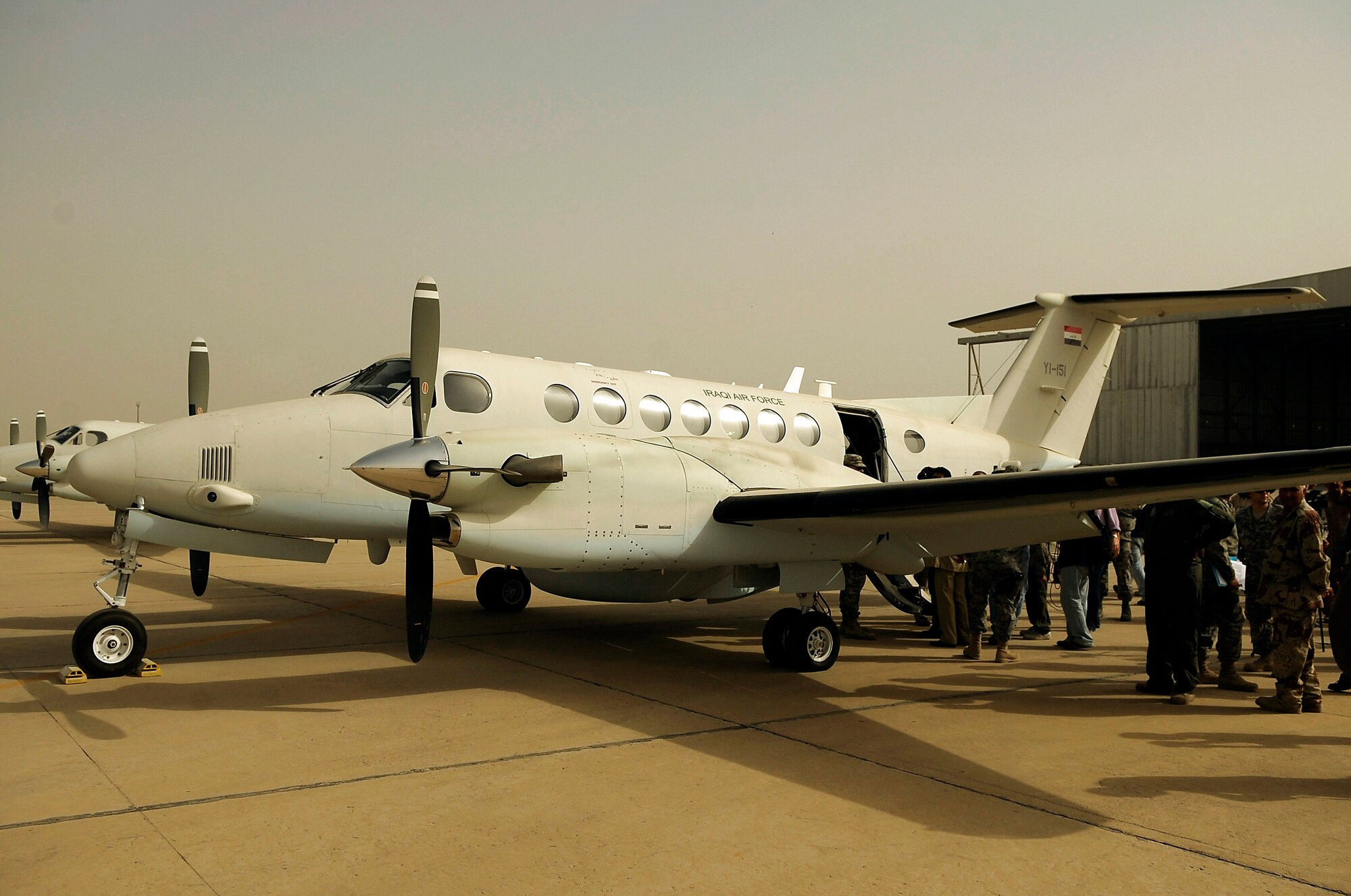 A Cessna Caravan 208 sits on the flightline at New Al Muthana Air Base, Iraq, on July 9. Army Lt. Gen. Helmick, commander of Multi-National Security Transition Command - Iraq, signed over eight Cessna 172s and three Cessna Caravan 208s worth more than $9 million to the Iraqi Defense Minister. (U.S. Air Force photo/Tech. Sgt. Jeffrey Allen)