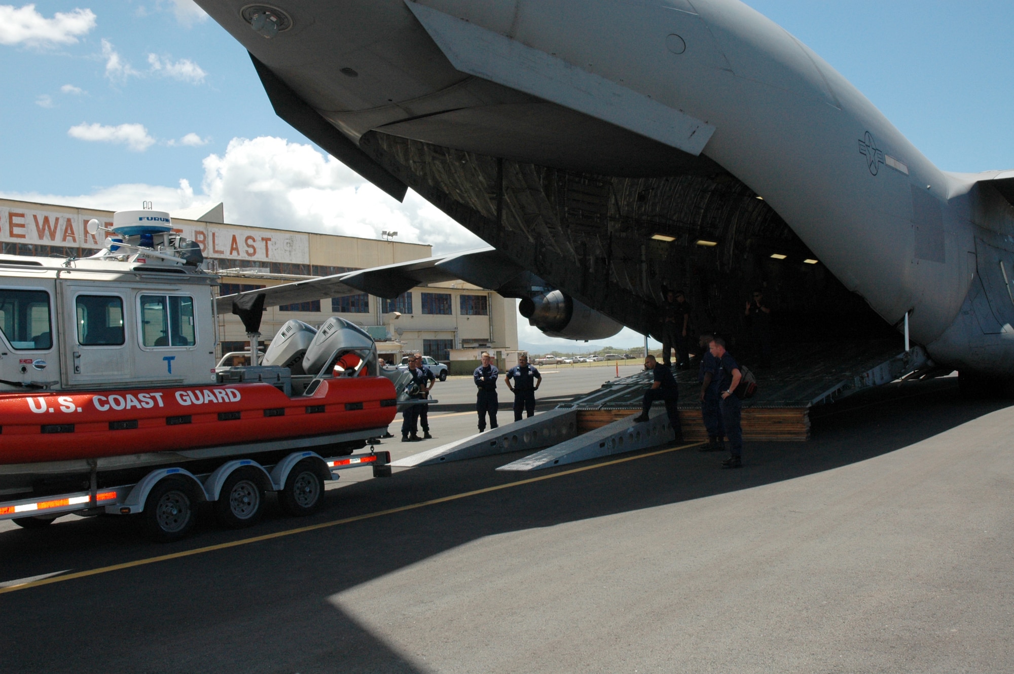 A Charleston C-17 was used to move two Response Boat-Small watercrafts for the Coast Guard's Maritime Safety and Security Team in Honolulu, Hawaii.  The boats, which are used for search and rescue, homeland security and other Coast Guard functions and missions, were being transported from one island to another for a training mission. (U.S. Air Force photo/Master Sgt. Mary Hinson)