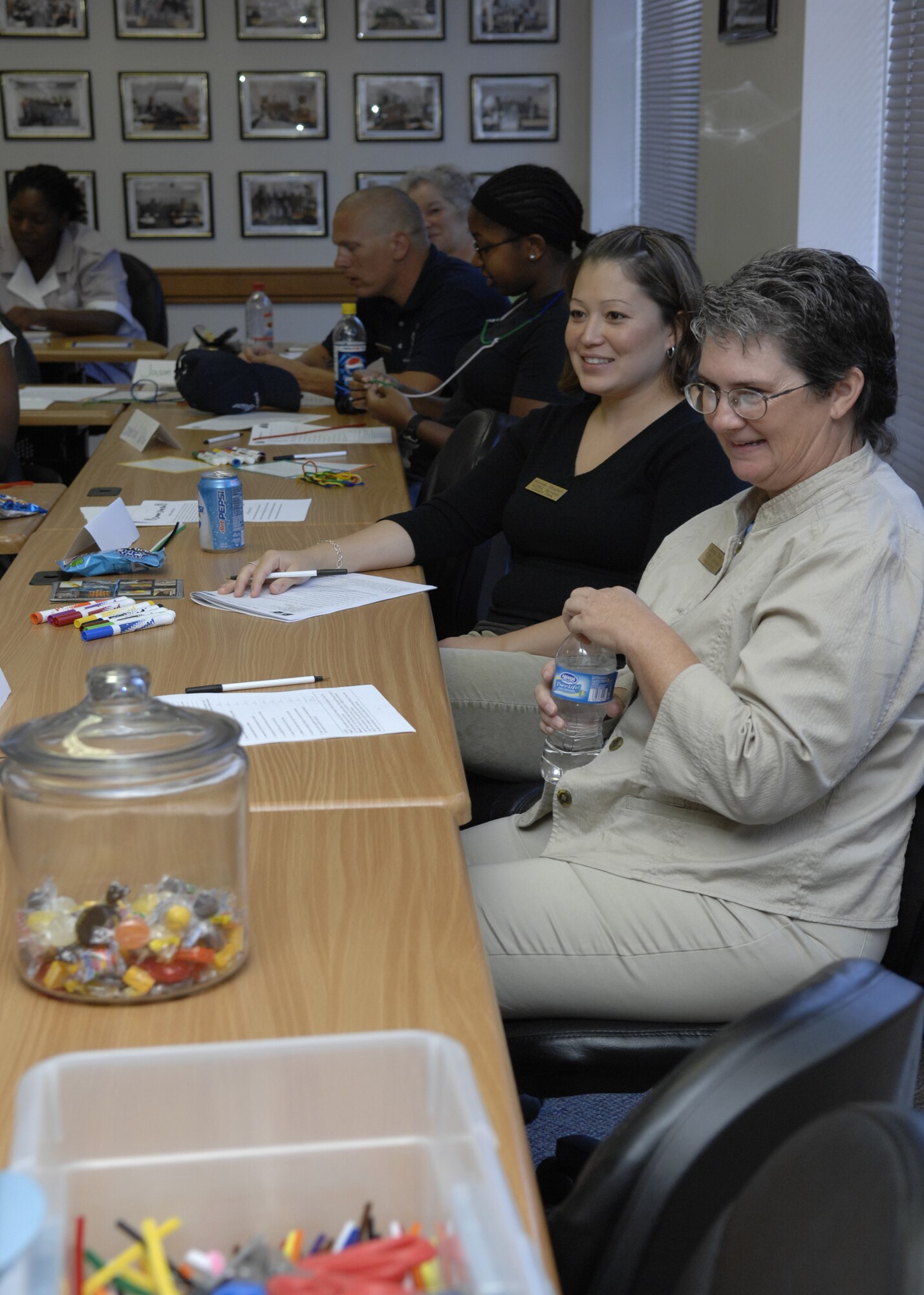Team Holloman members take part in the Customer College Course held at Holloman's Customer College and Training Center, July 2 at Holloman Air Force Base, N.M.  (U.S. Air Force photo/Airman 1st Class Rachel A. Kocin)