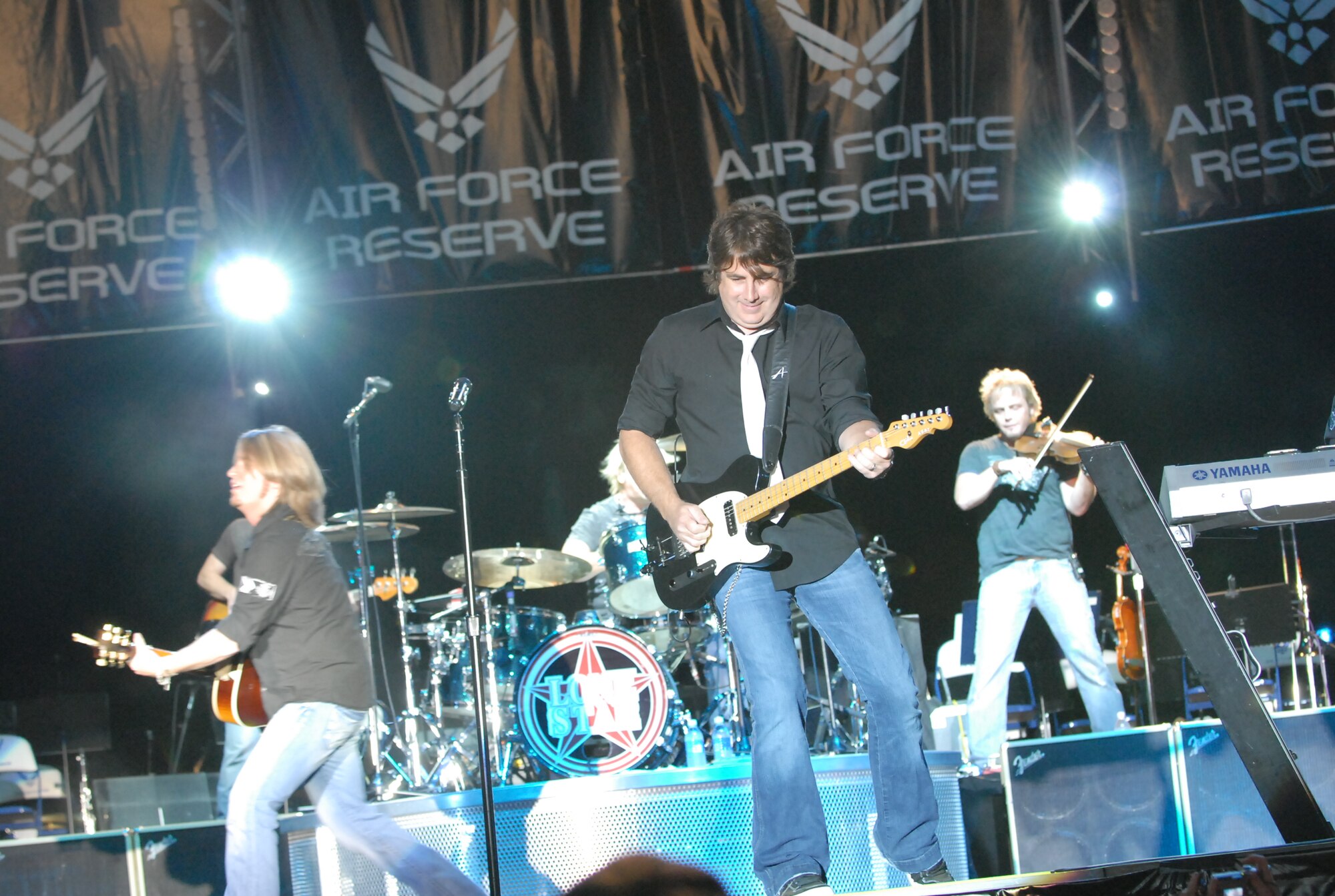 Lonestar members perform during the 25th Annual Independence Day Concert July3 at  the McConnell-Talbert Stadium.