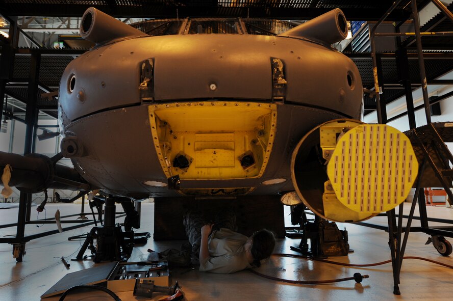 MOODY AIR FORCE BASE, Ga. -- Staff Sgt. Kristy Beaudoin, 23rd Equipment Maintenance Squadron aircraft structural maintenance craftsman, replaces a lower antenna bracket on an HH-60G Pave Hawk here June 24. (U.S. Air Force photo by Senior Airman Gina Chiaverotti) 