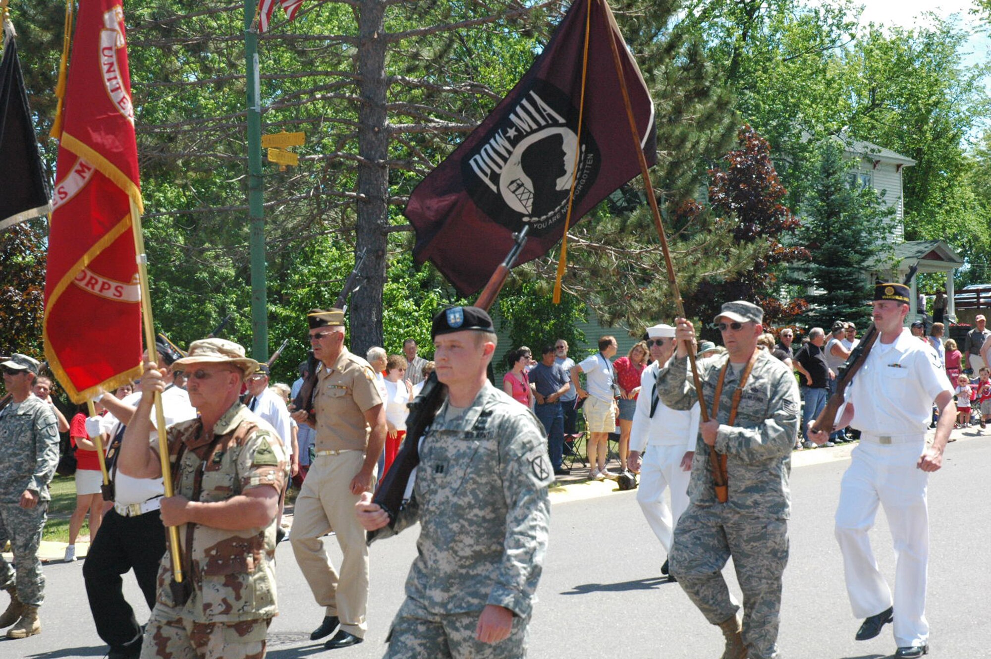 Members of the Veterans of Foreign Wars Post 9084 Color Guard march down Main Street of Wakefield, Mich., leading the Independence Day Parade July 4, 2008.  (U.S. Air Force Photo/Bobbi Sturkol)