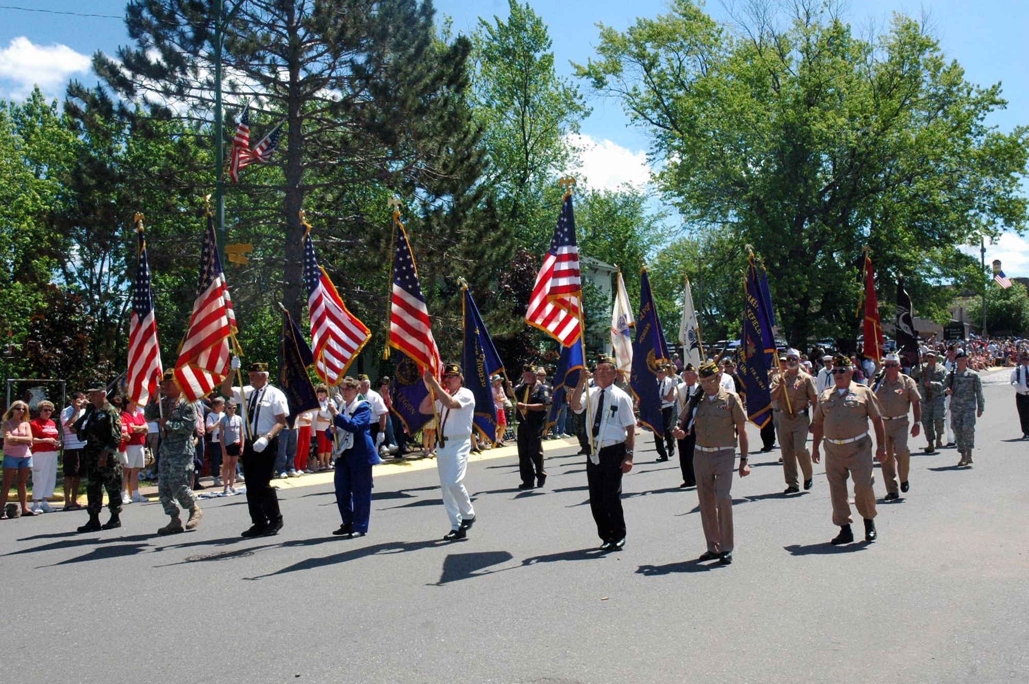 Members of the Veterans of Foreign Wars Post 9084 Color Guard march down Main Street of Wakefield, Mich., for the Independence Day Parade July 4, 2008.  (U.S. Air Force Photo/Bobbi Sturkol)