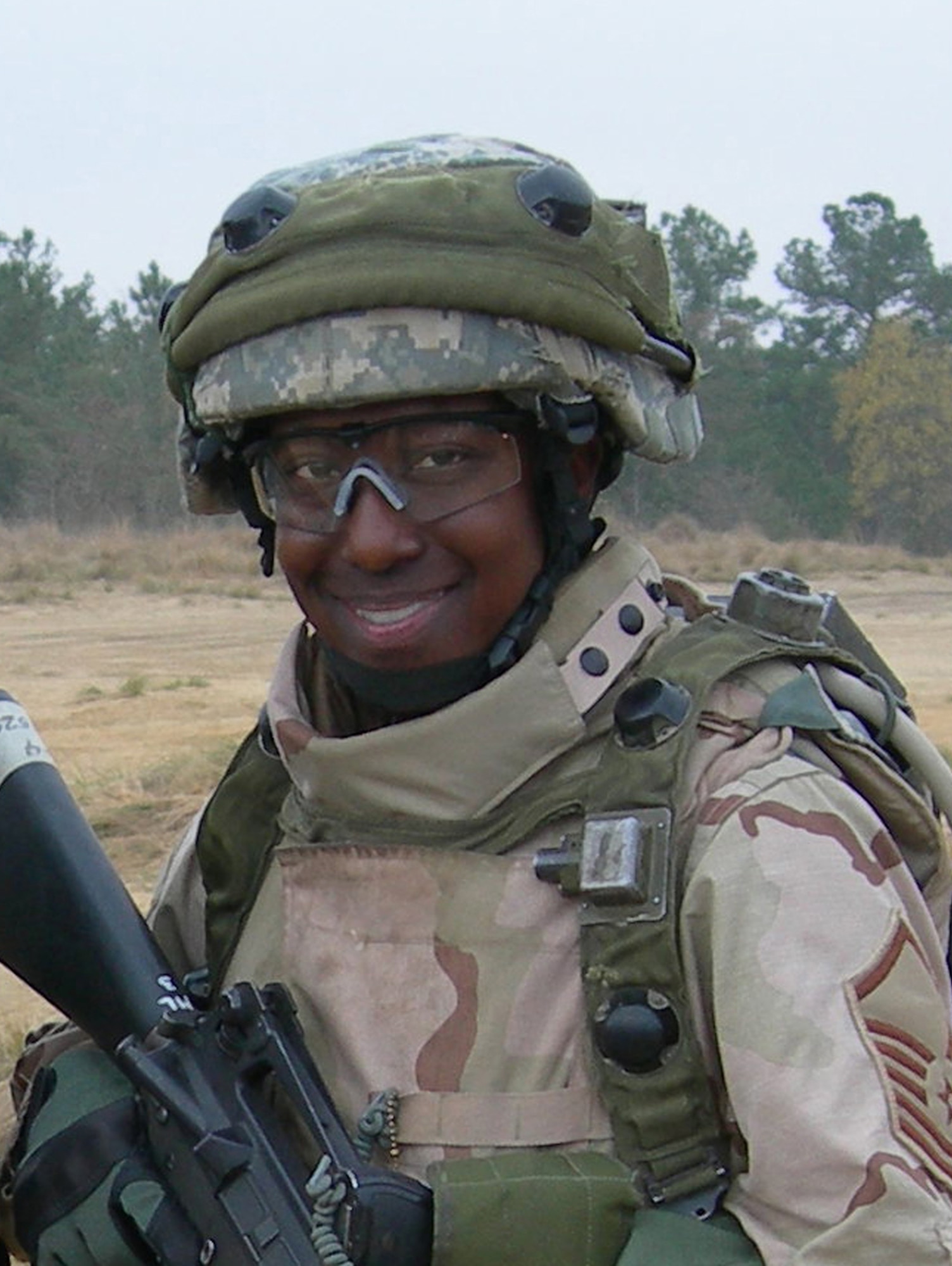 Master Sgt. Carla Curry, one of the 12 Outstanding Airmen of the Year for 2008, during her extended 365-day deployment to Afghanistan in 2006. While deployed, she earned the Bronze Star for direct joint combat operations support to 110 troops. Sergeant Curry is the superintendent of the Enlisted Extended Deployment Branch at the Air Force Personnel Center at Randolph Air Force Base, Texas.        