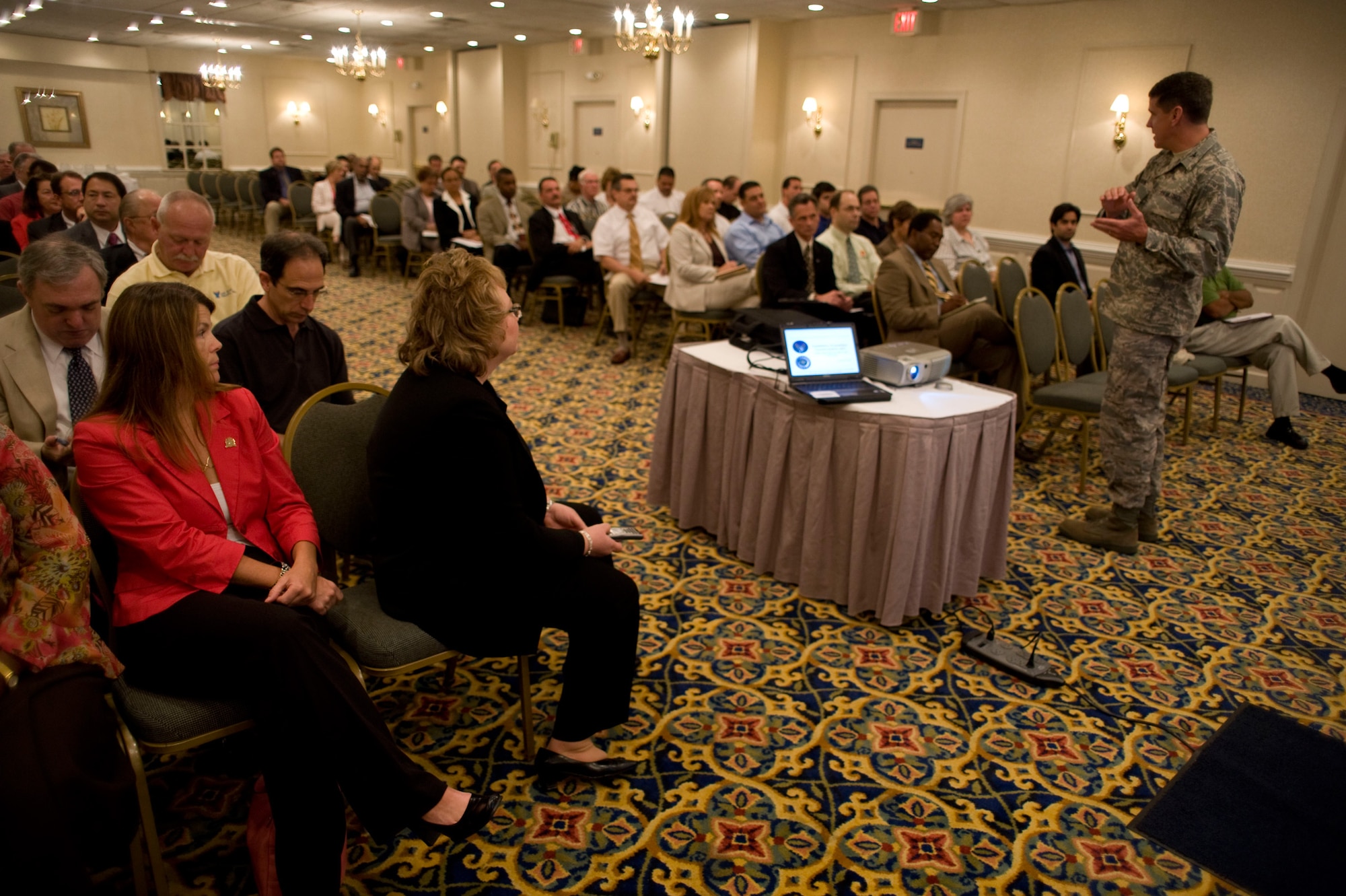 LANGLEY AIR FORCE BASE, Va. -- Col. Mark Hobson, Air Force Material Command installation acquisition center provisional director, Wright-Paterson Air Force Base, Ohio, speaks to local business and industry personnel at Newport News, Va., July 10, regarding an installation acquisition transformation.  Colonel Hobson spoke to the audience about the Air Force's new regional-based procurement methods and how Hampton Roads will become home to one of five regional contracting centers.  The center is scheduled to stand up in 2011, and will bring about 400 new contracting personnel to the area.  (U.S. Air Force photo/Staff Sgt. Barry Loo)