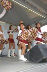 Brandy Ruiz, left, daughter of Rick and Rosemary Ruiz, and the San Antonio Roses perform during the 2008 Star Spangled Festival July 4. (USAF photo by Alan Boedeker)